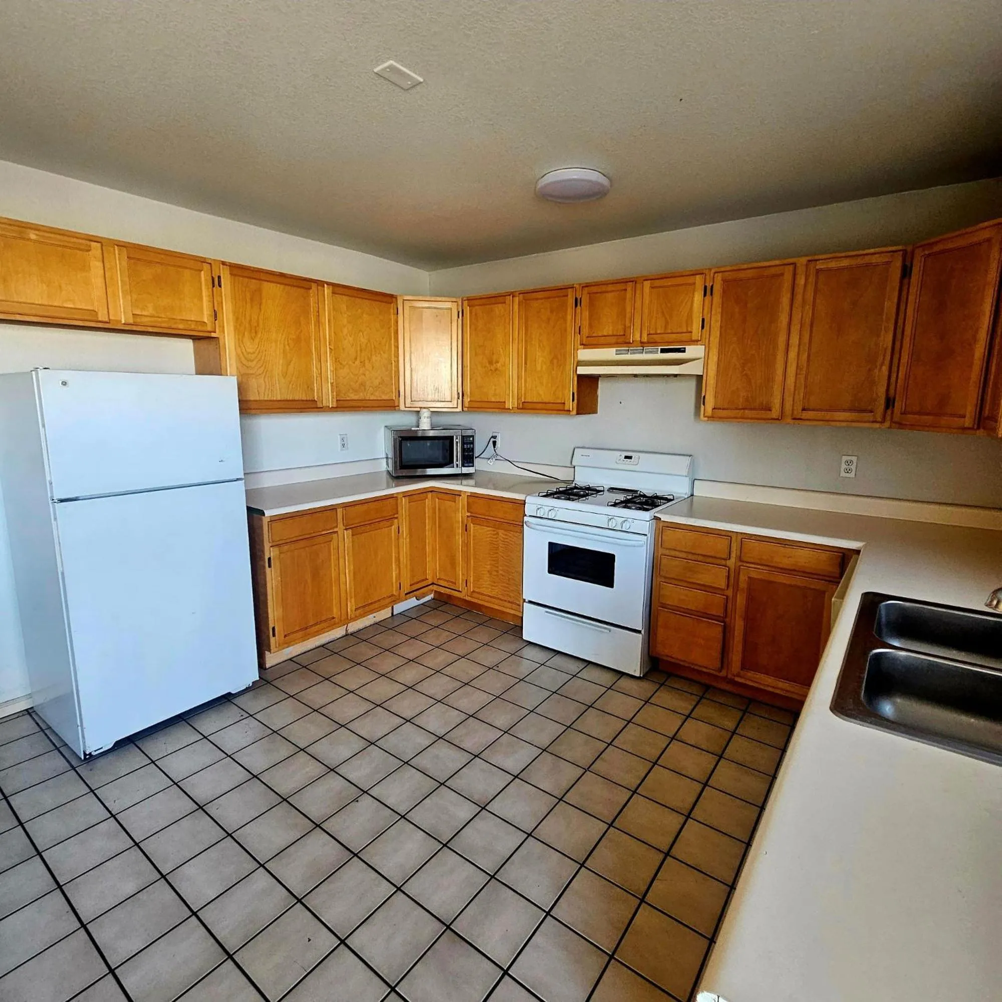 Kitchen or kitchenette in Super 8 by Wyndham Denver Central