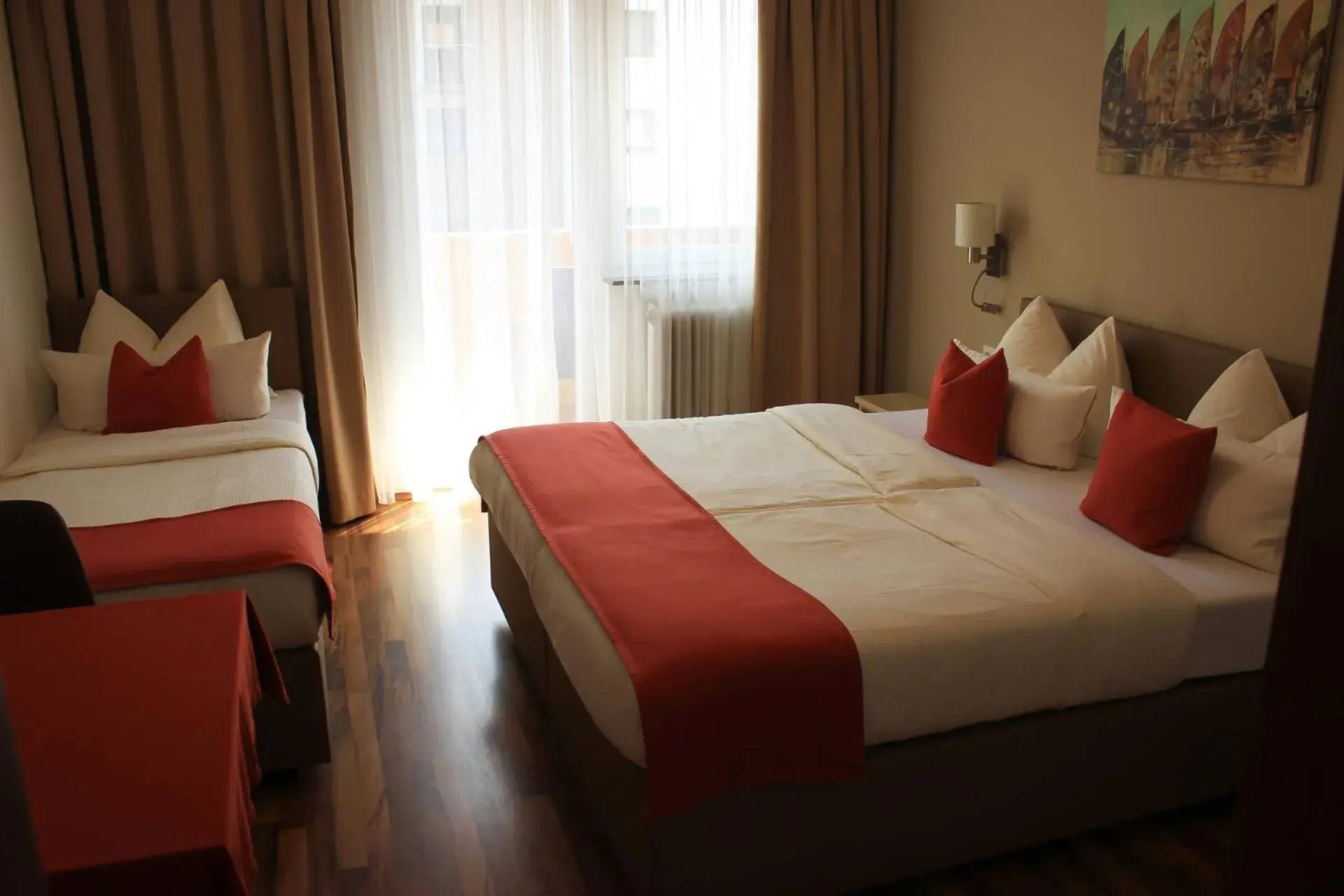 Triple Room in Hotel Alpenland Triple Room in Hotel Alpenland