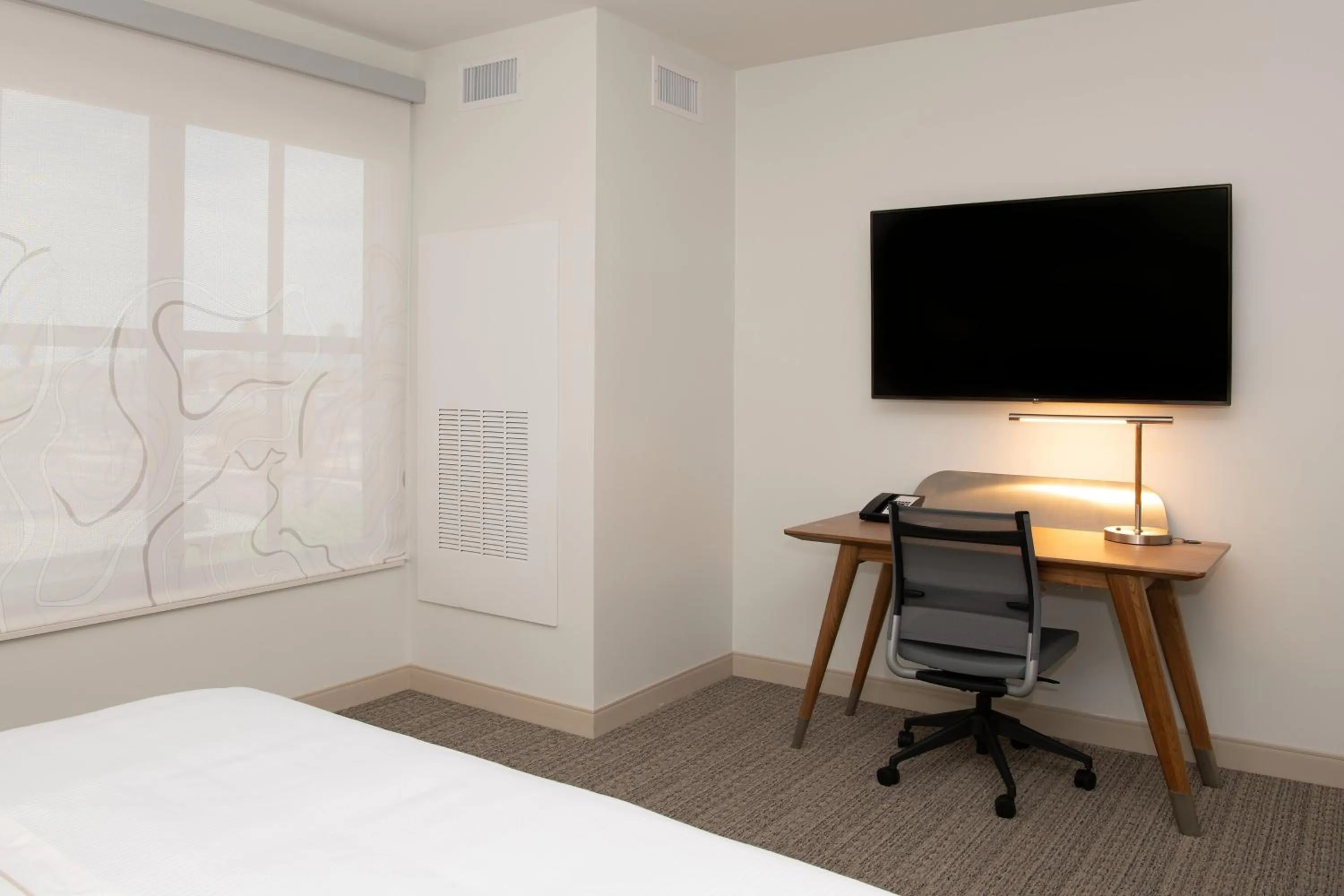 Photo of the whole room, Bed in Element Scottsdale at SkySong