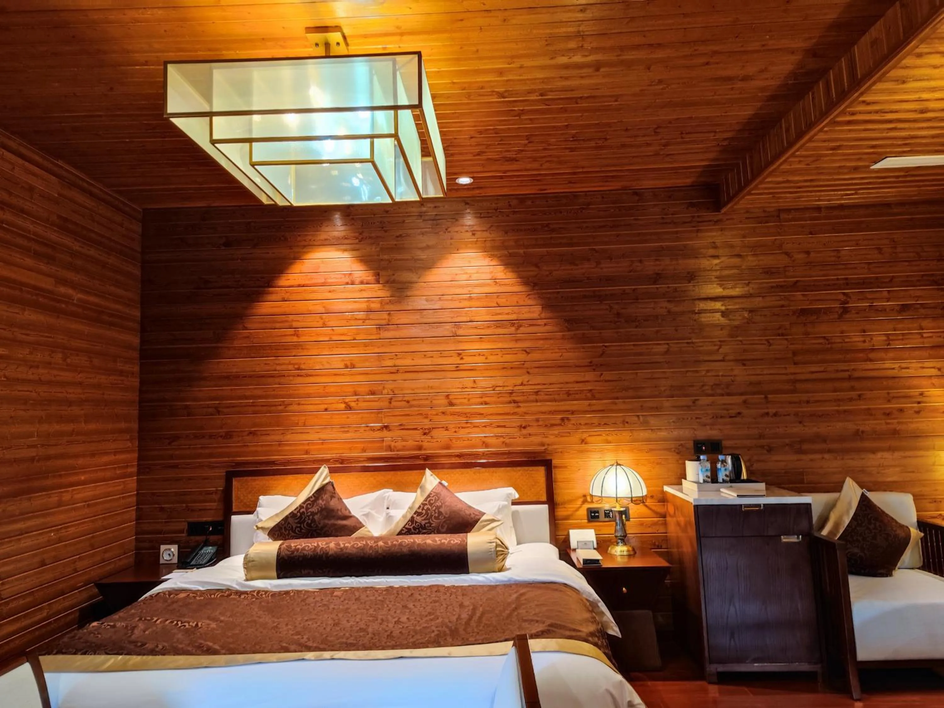 Bed in Prince Manor Resort