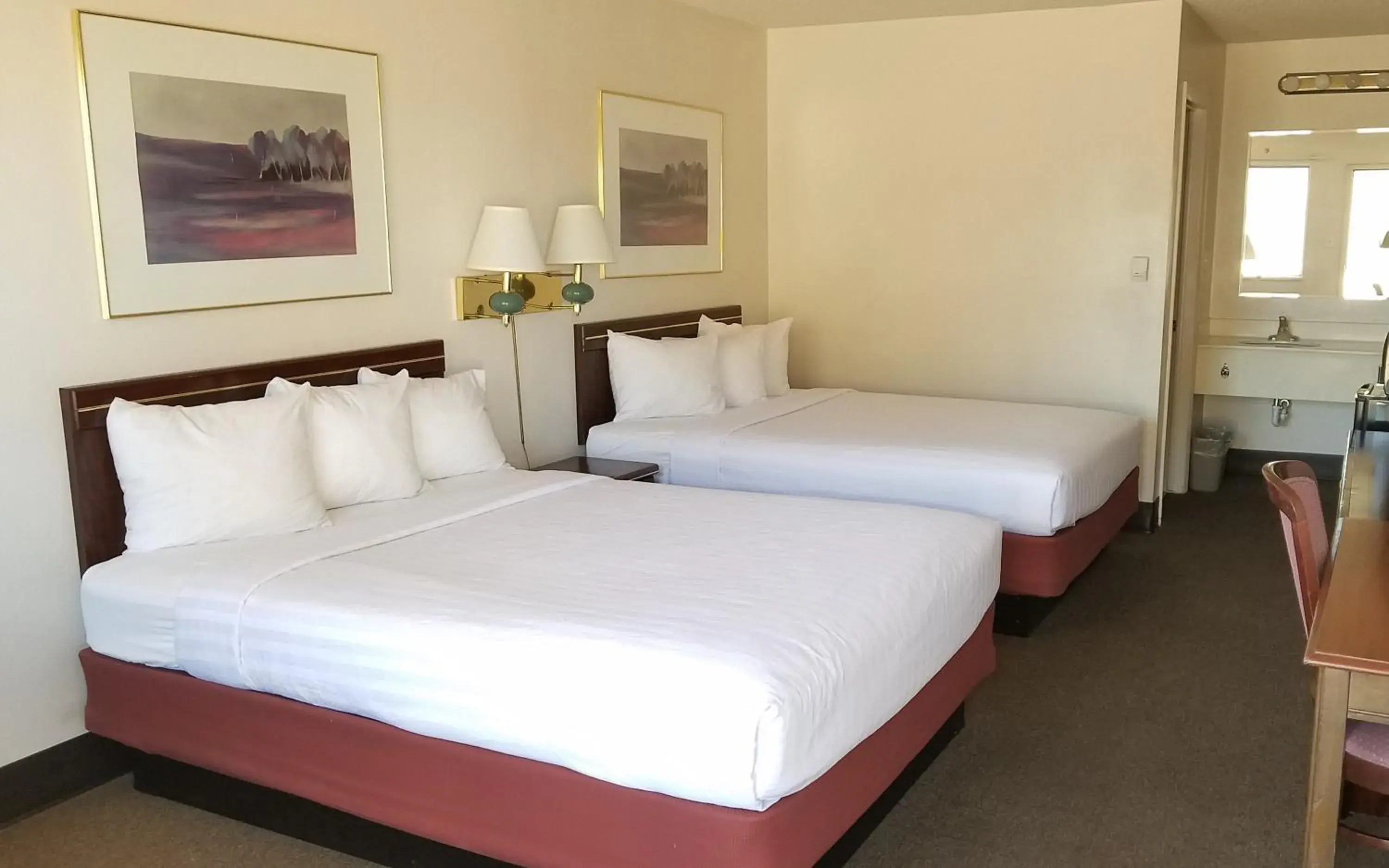 Queen Room with Two Queen Beds - Non-Smoking in Motel 8 Laramie Queen Room with Two Queen Beds - Non-Smoking in Motel 8 Laramie