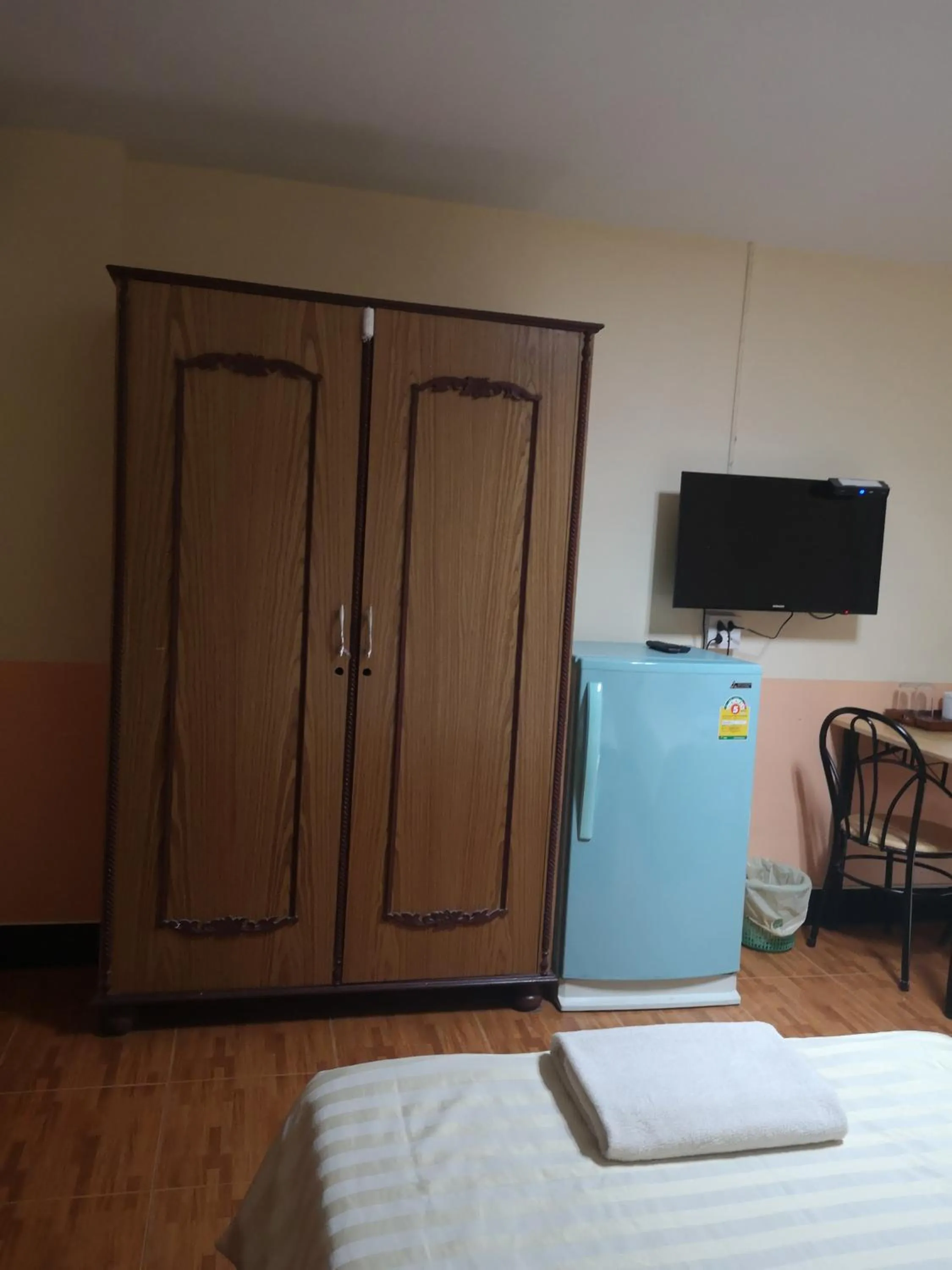 Bed in Sab Suwarn Mansion