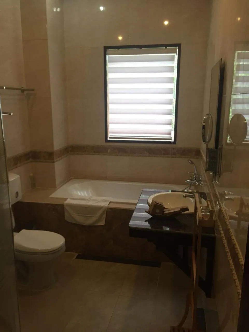 Bathroom in Seasons Riverside Hotel