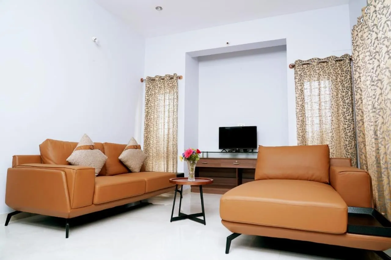 Living room in UNNATHI SUITES