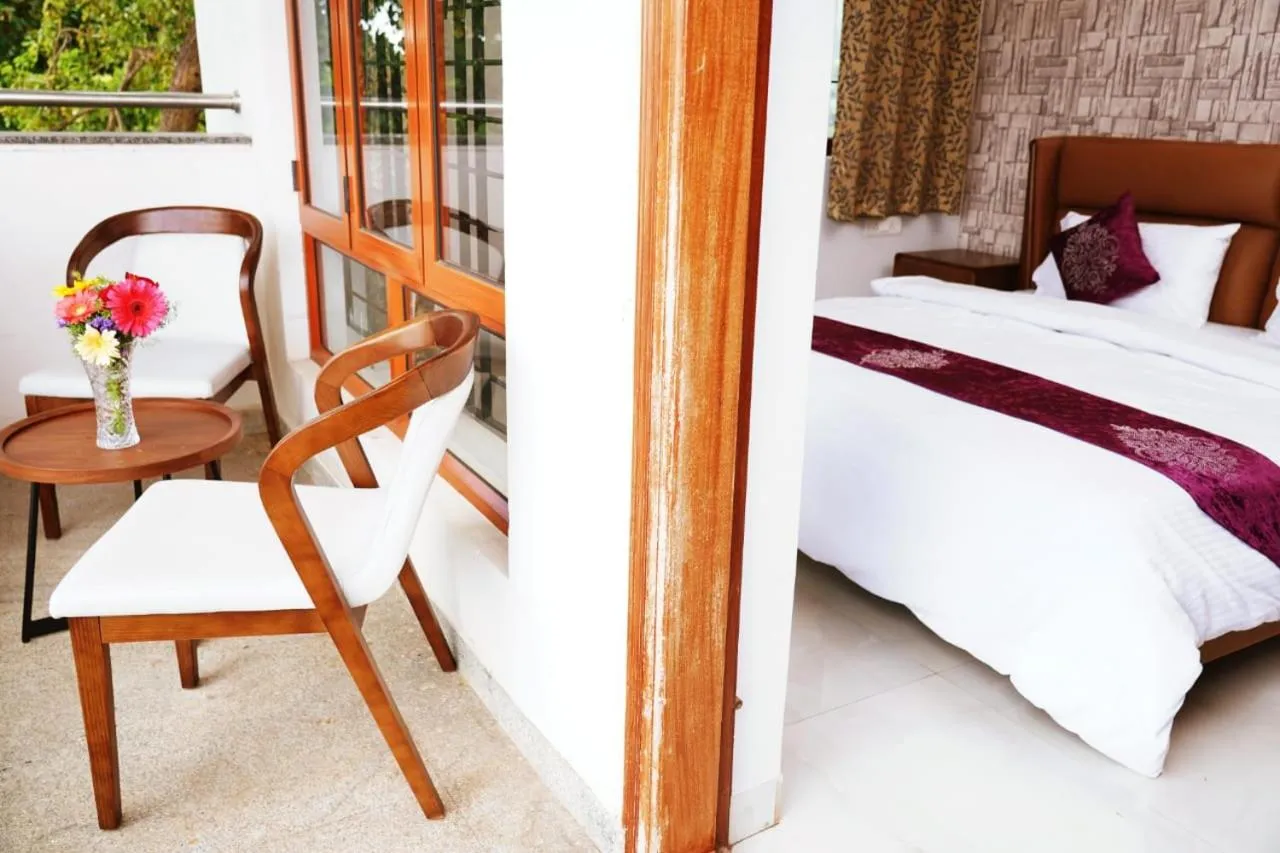 Bed in UNNATHI SUITES