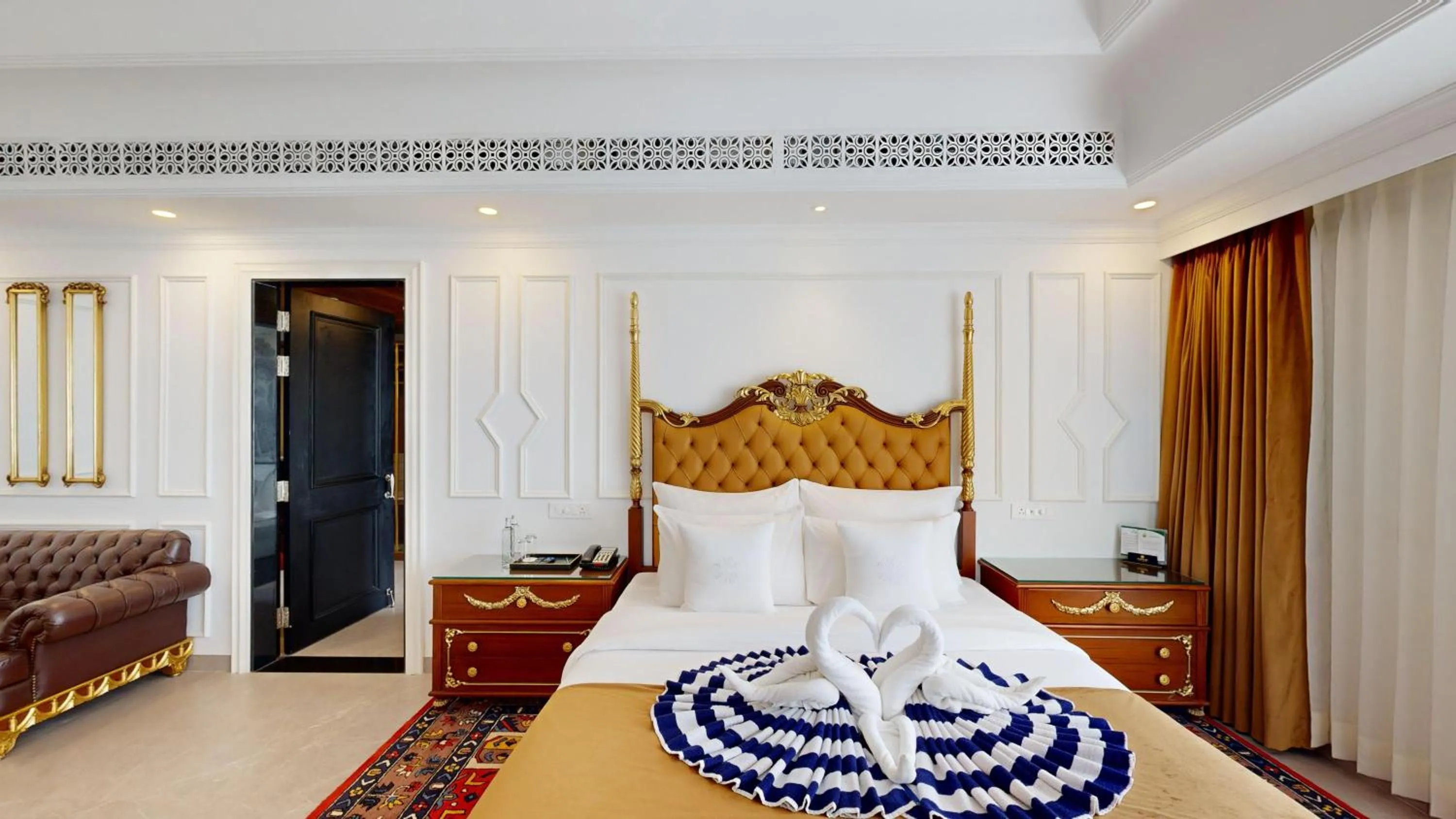 Bed in Mayfair Palm Beach Resort