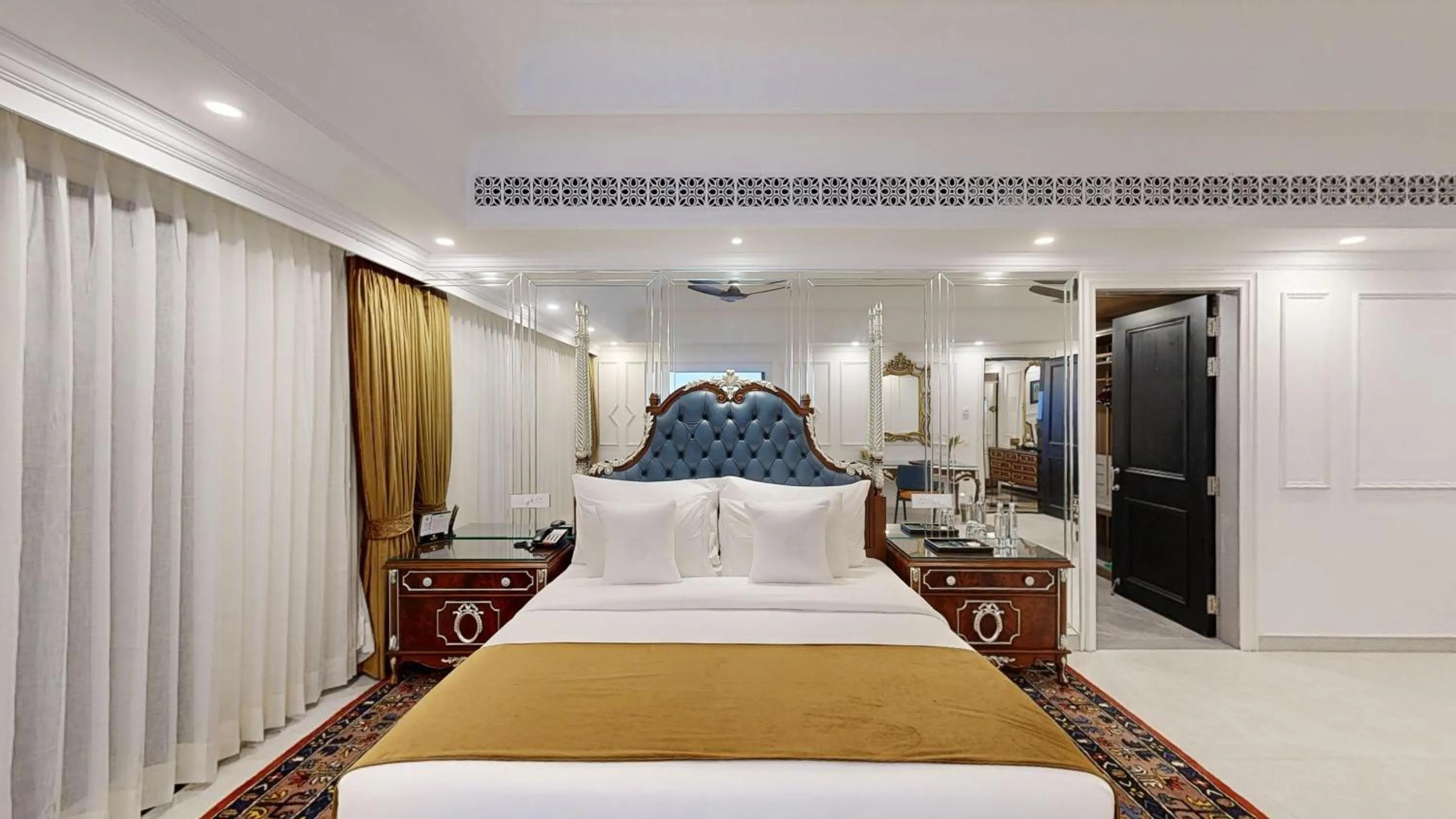 Bed in Mayfair Palm Beach Resort