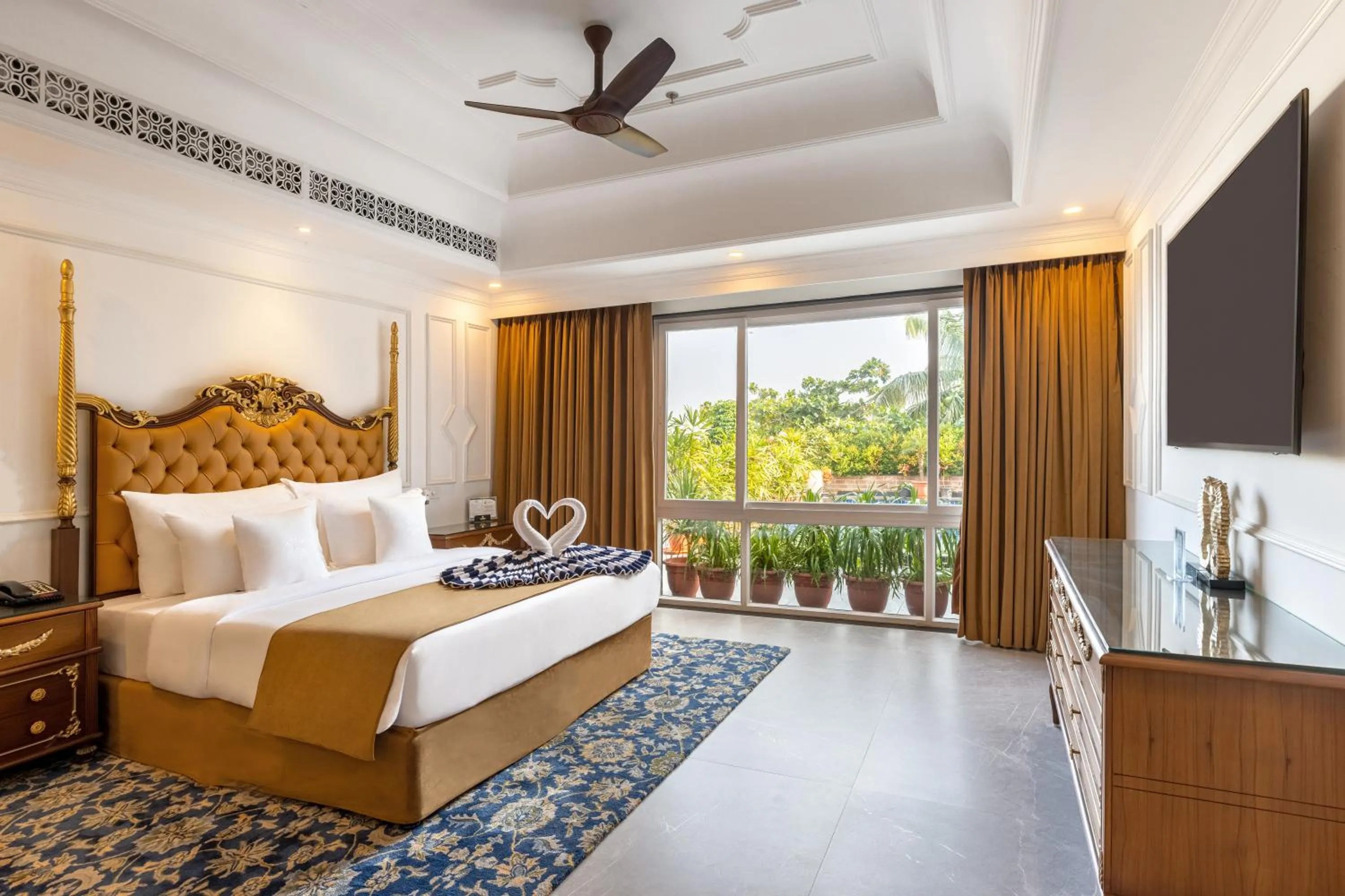 Bed in Mayfair Palm Beach Resort