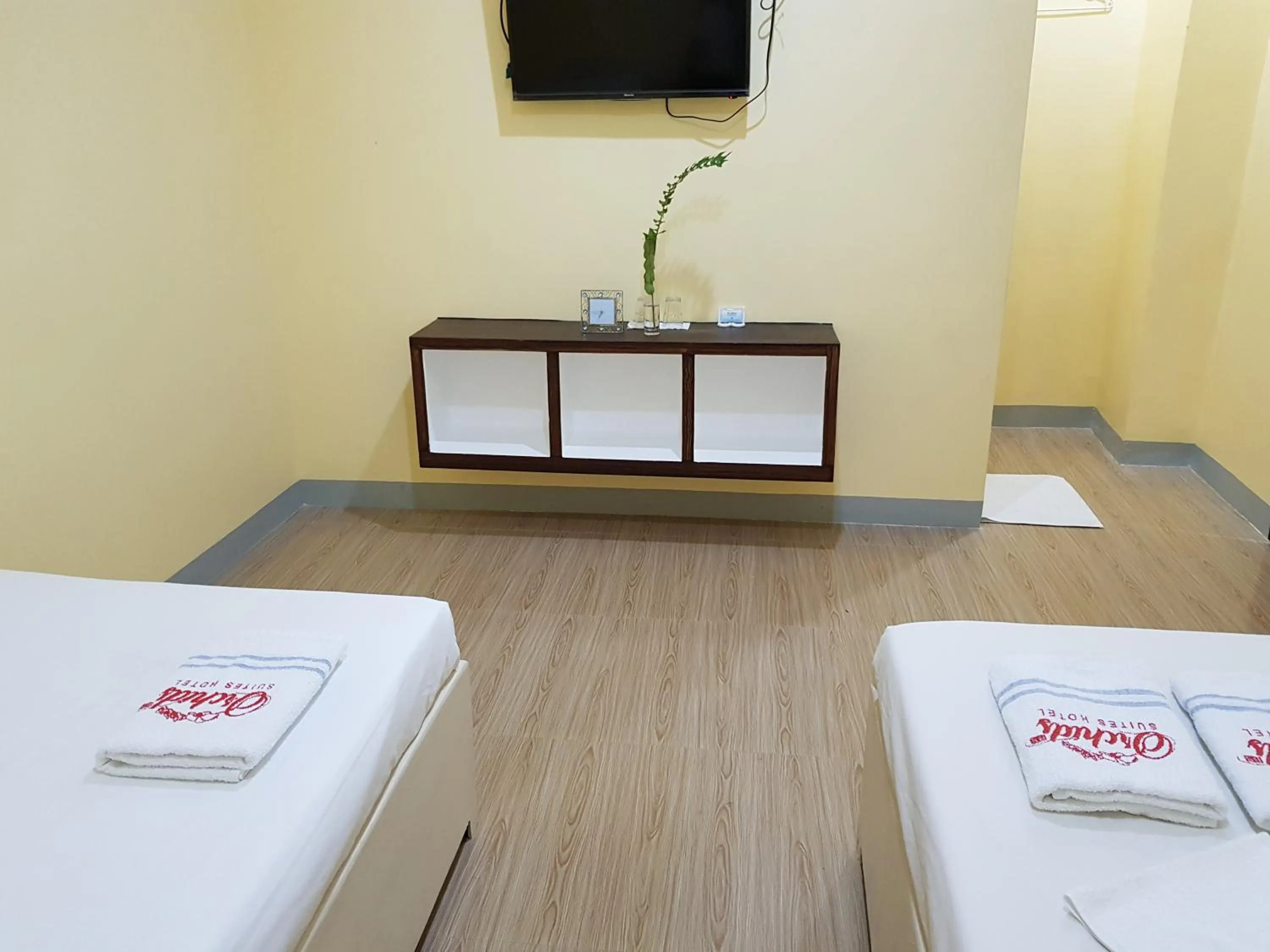 Bed in B&S Orchids suites hotel