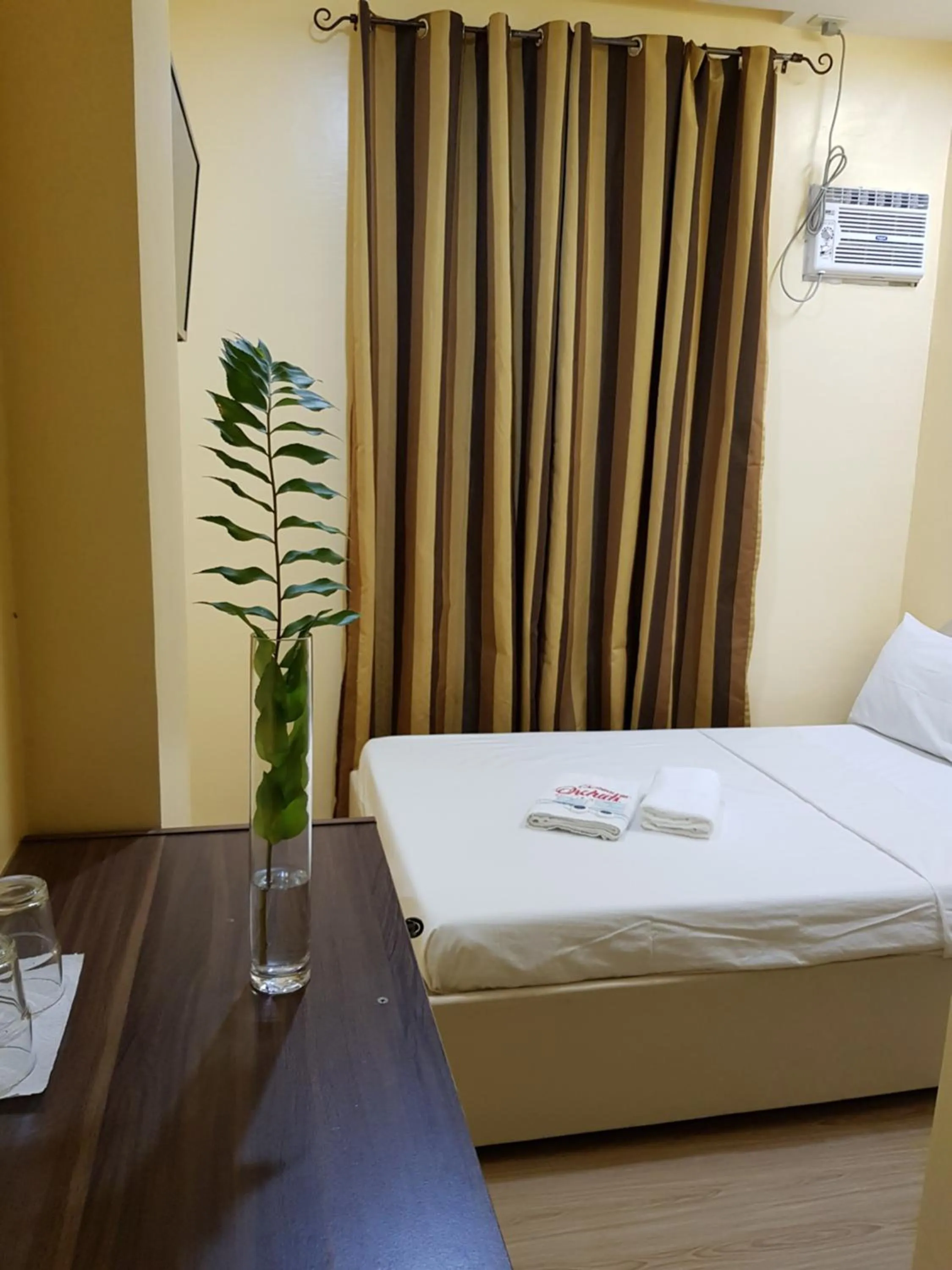 Bed in B&S Orchids suites hotel