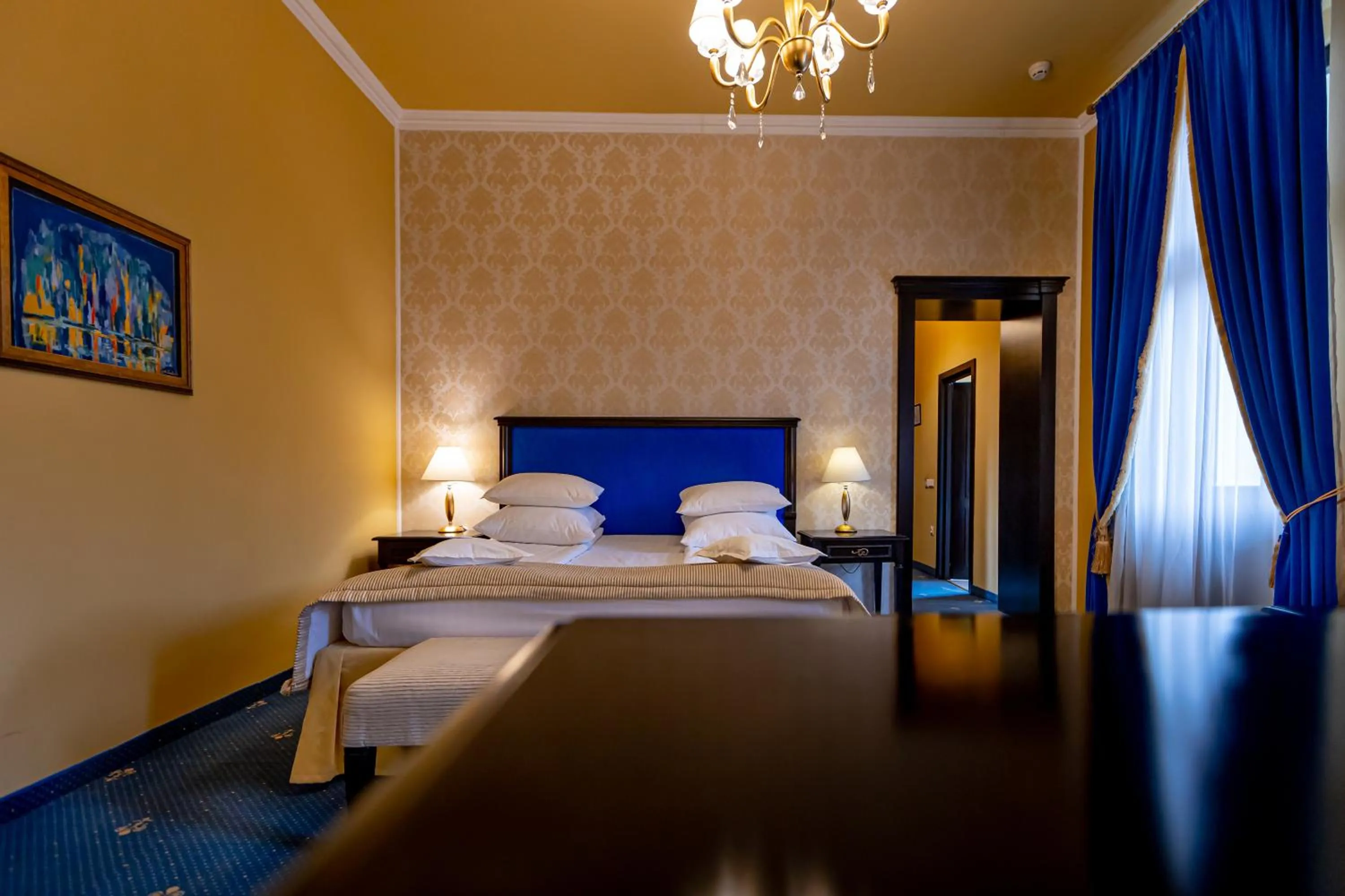 Bed in Hotel Central Park Sighisoara