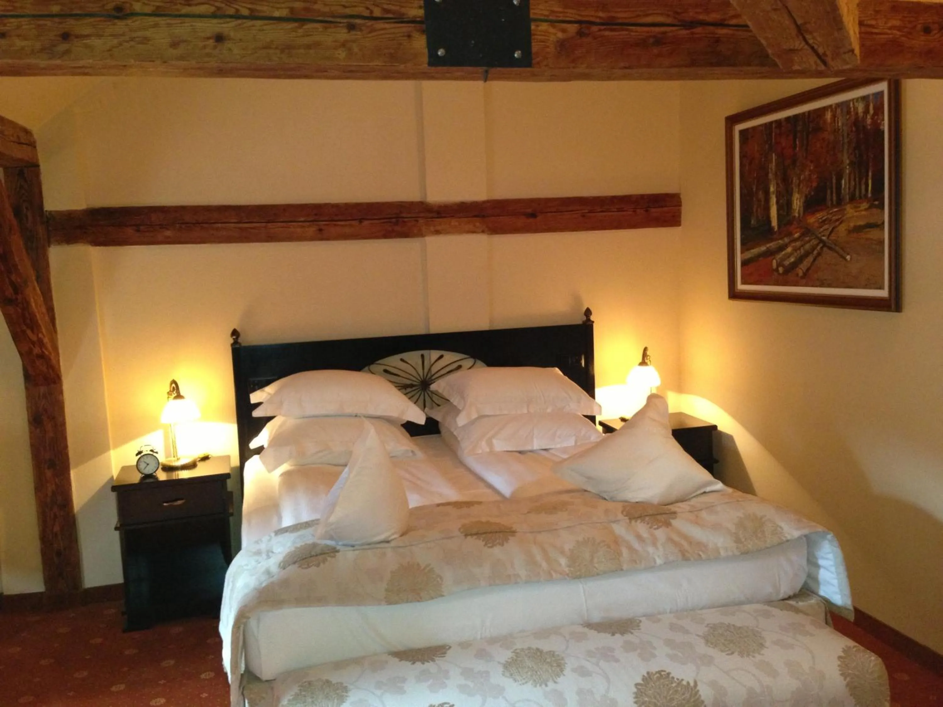Bed in Hotel Central Park Sighisoara