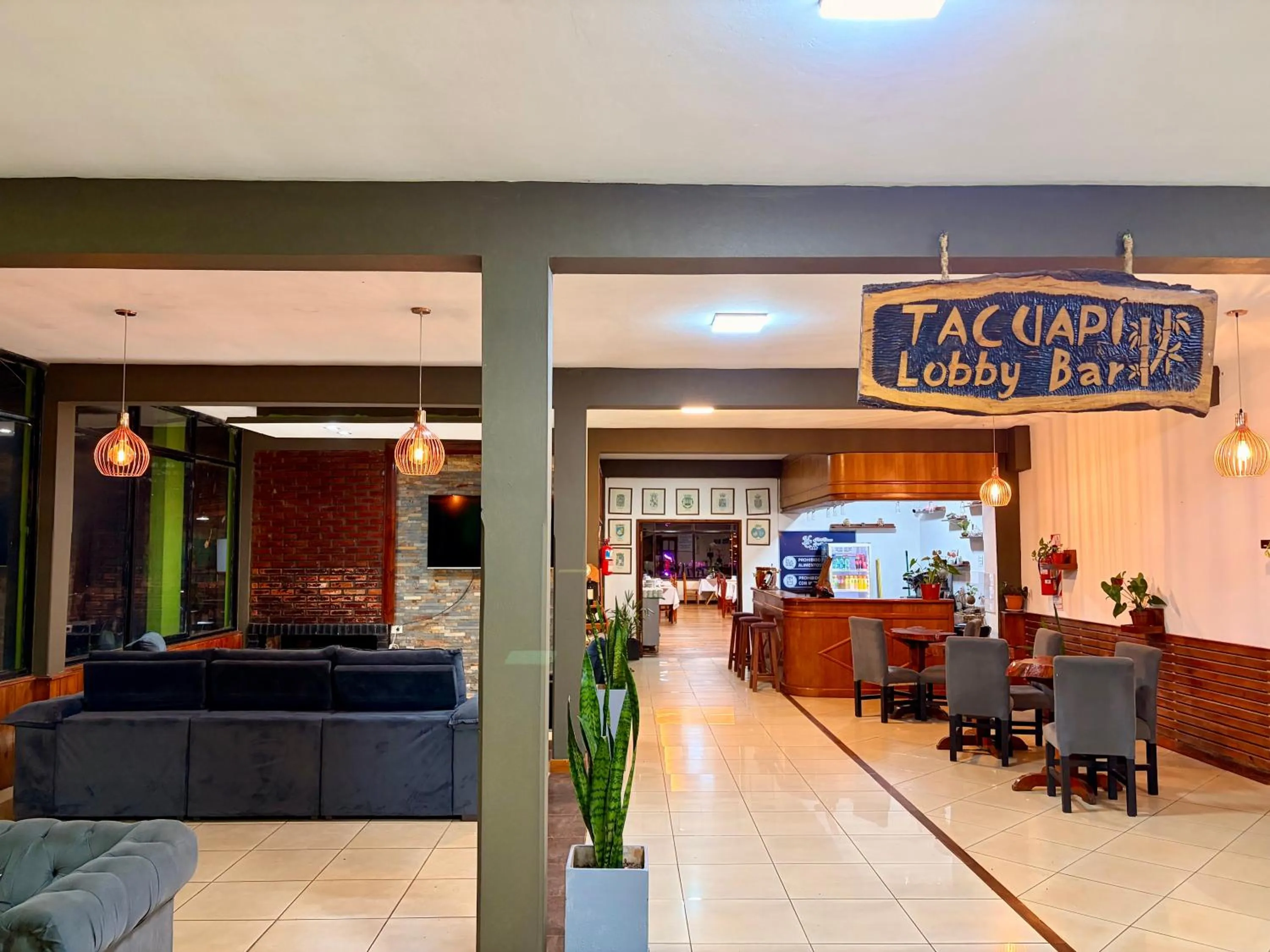 Communal lounge/ TV room in Hotel Carmen