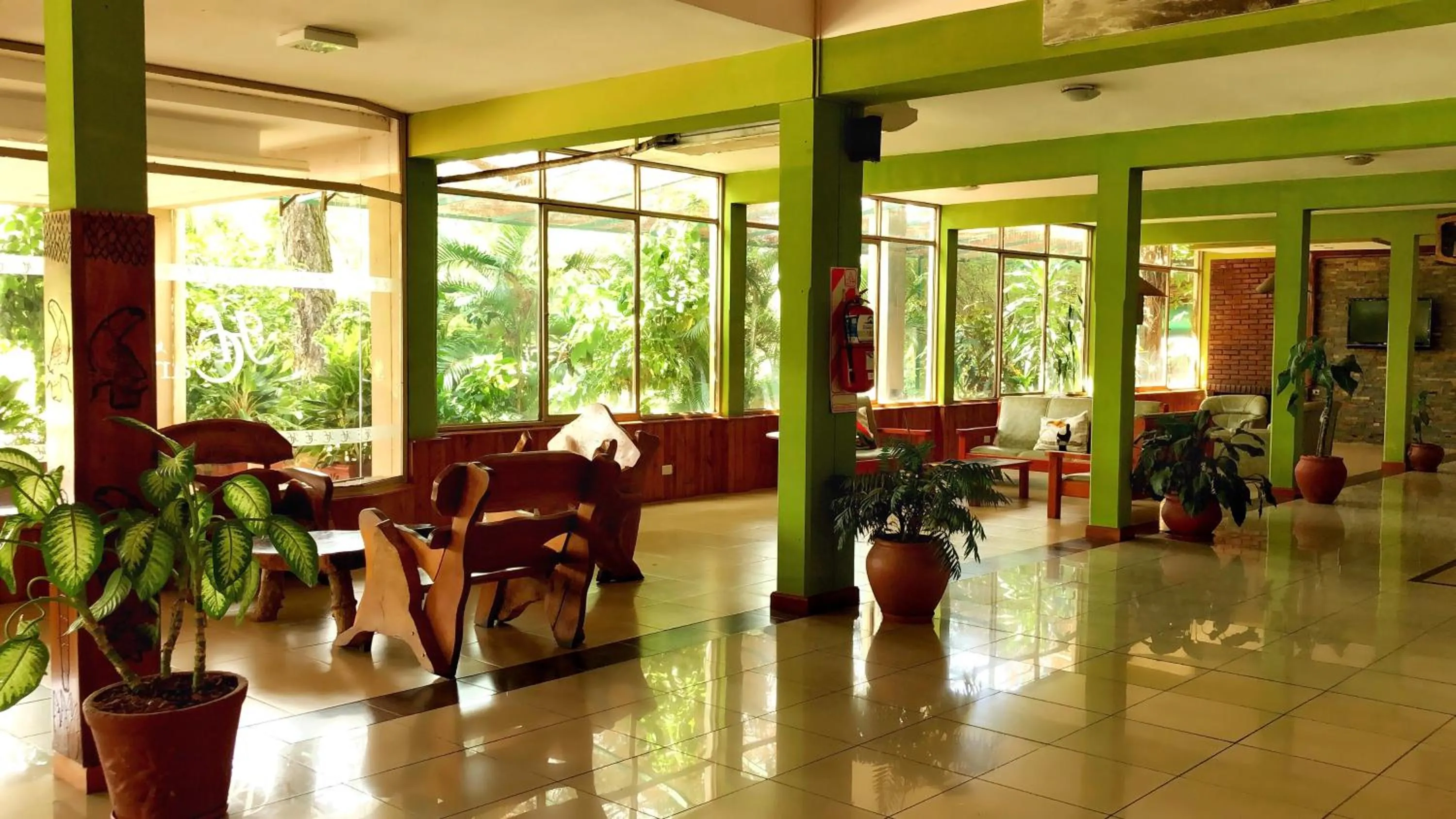 Communal lounge/ TV room in Hotel Carmen