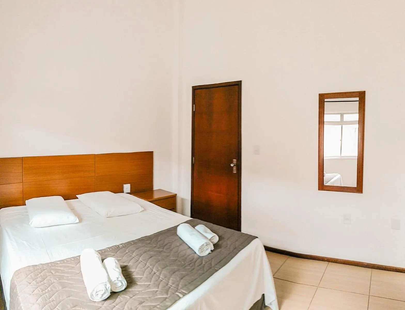 Bed in Cyrilo's Palace Hotel