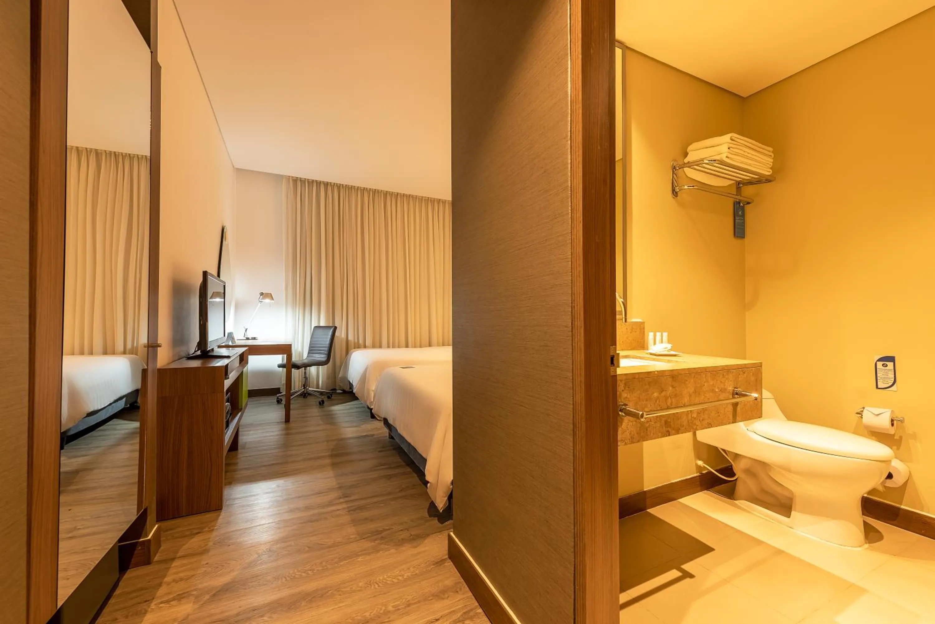 Bathroom, Bed in Hampton by Hilton Cartagena