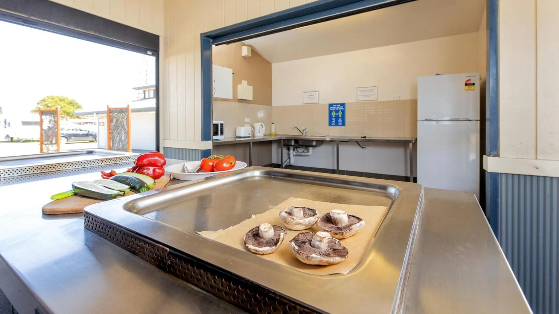 Kitchen or kitchenette in Woolgoolga Beach Holiday Park