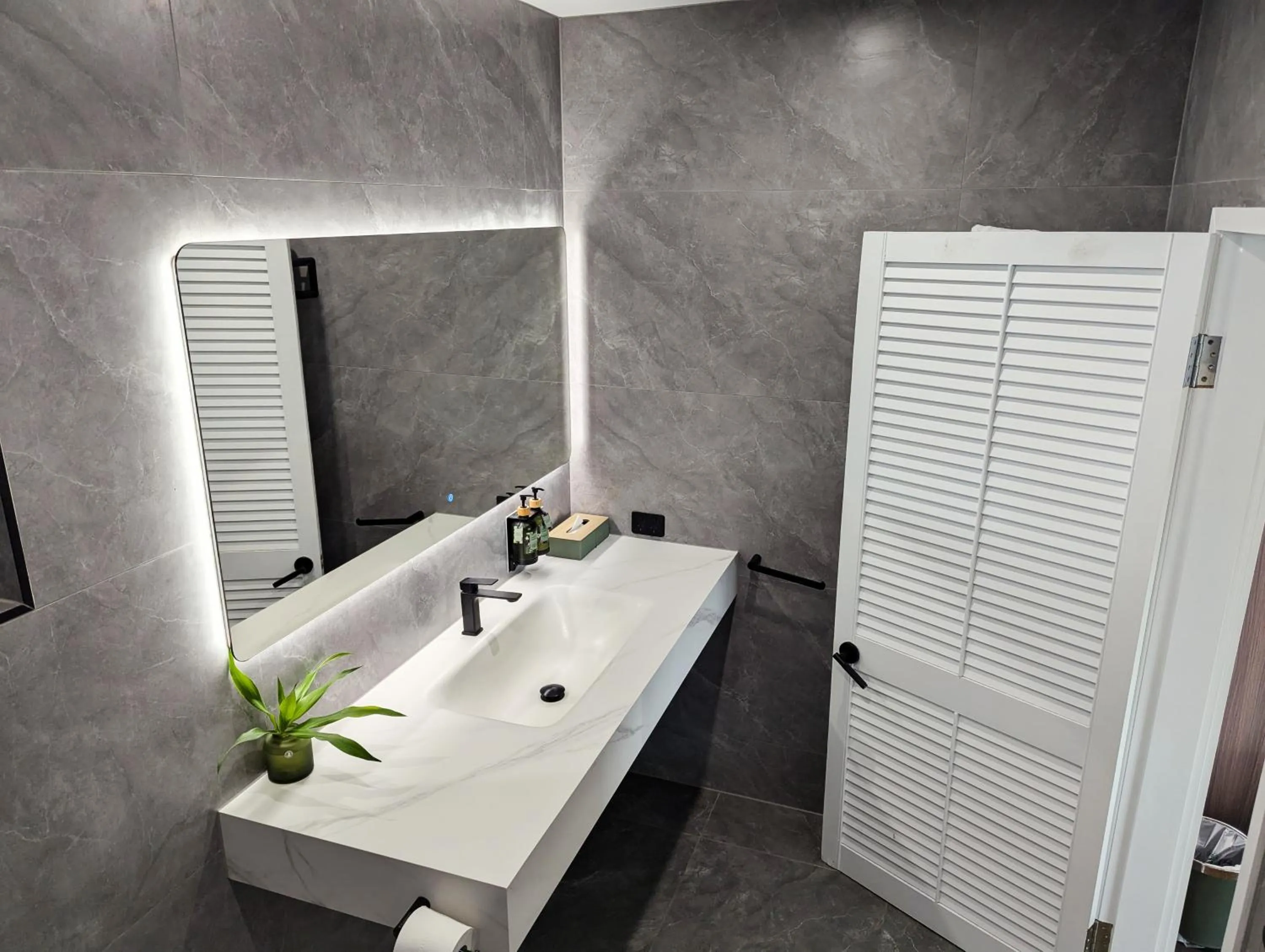 Bathroom in Ramada By Wyndham Cairns City Centre