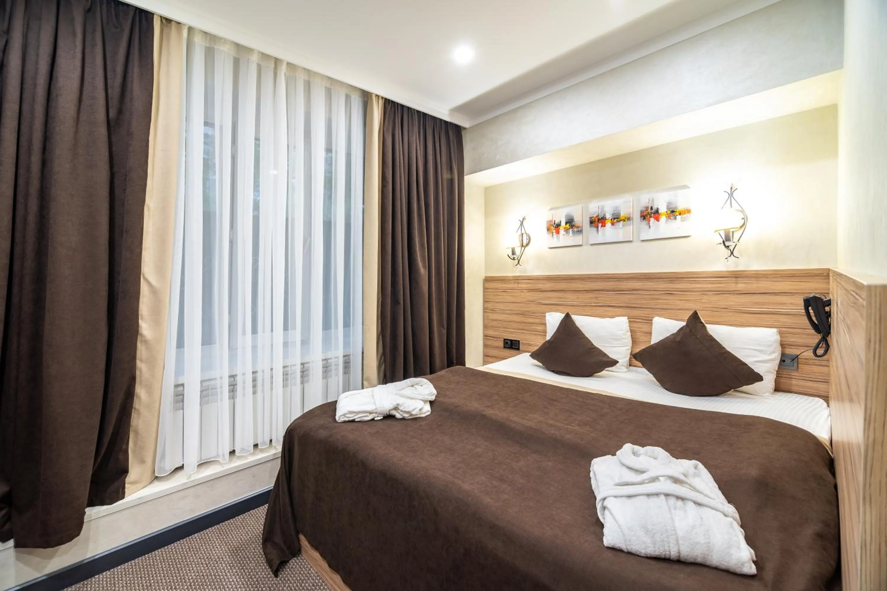 Bed in Mildom City Hotel