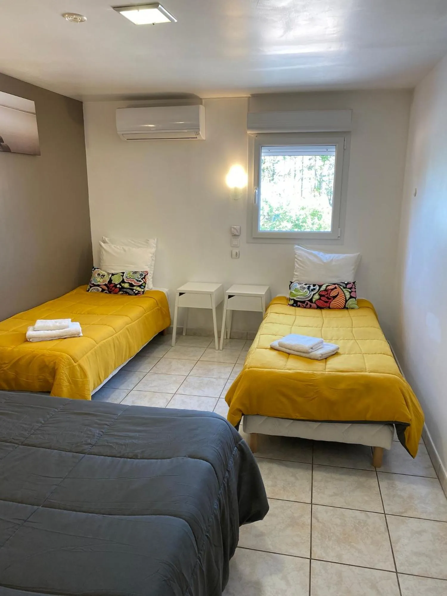 Bed in LOGIS Hôtel Restaurant La Chaumière