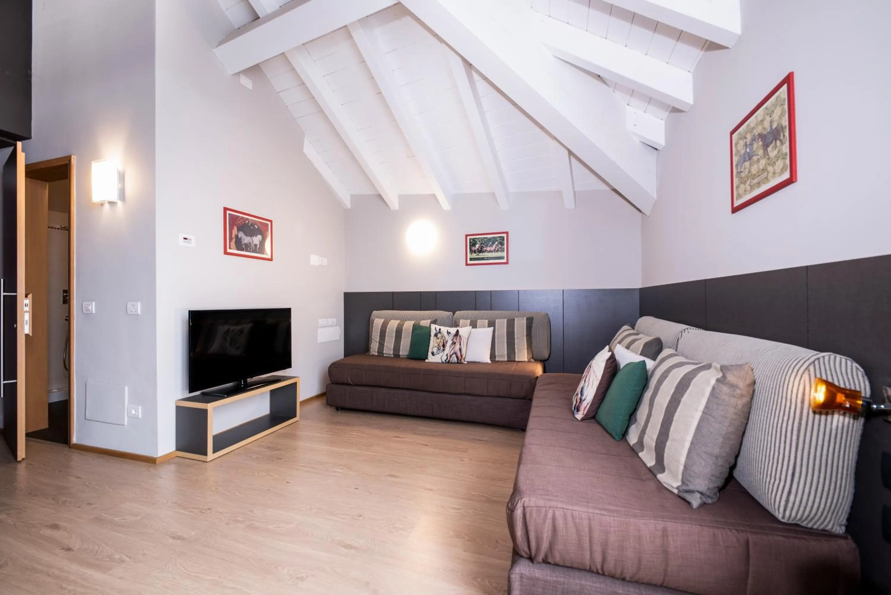 Seating area in Hotel Osteria della Pista dal 1875