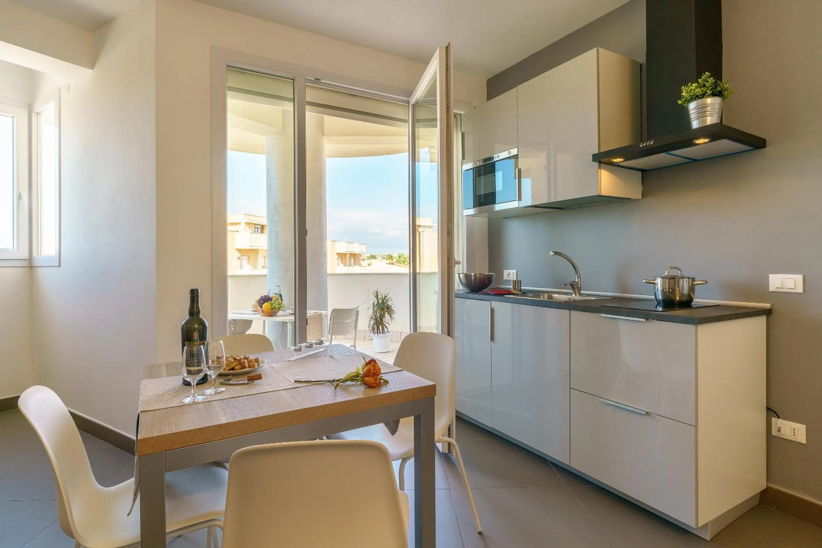 Kitchen or kitchenette in Travini Hotel Residence