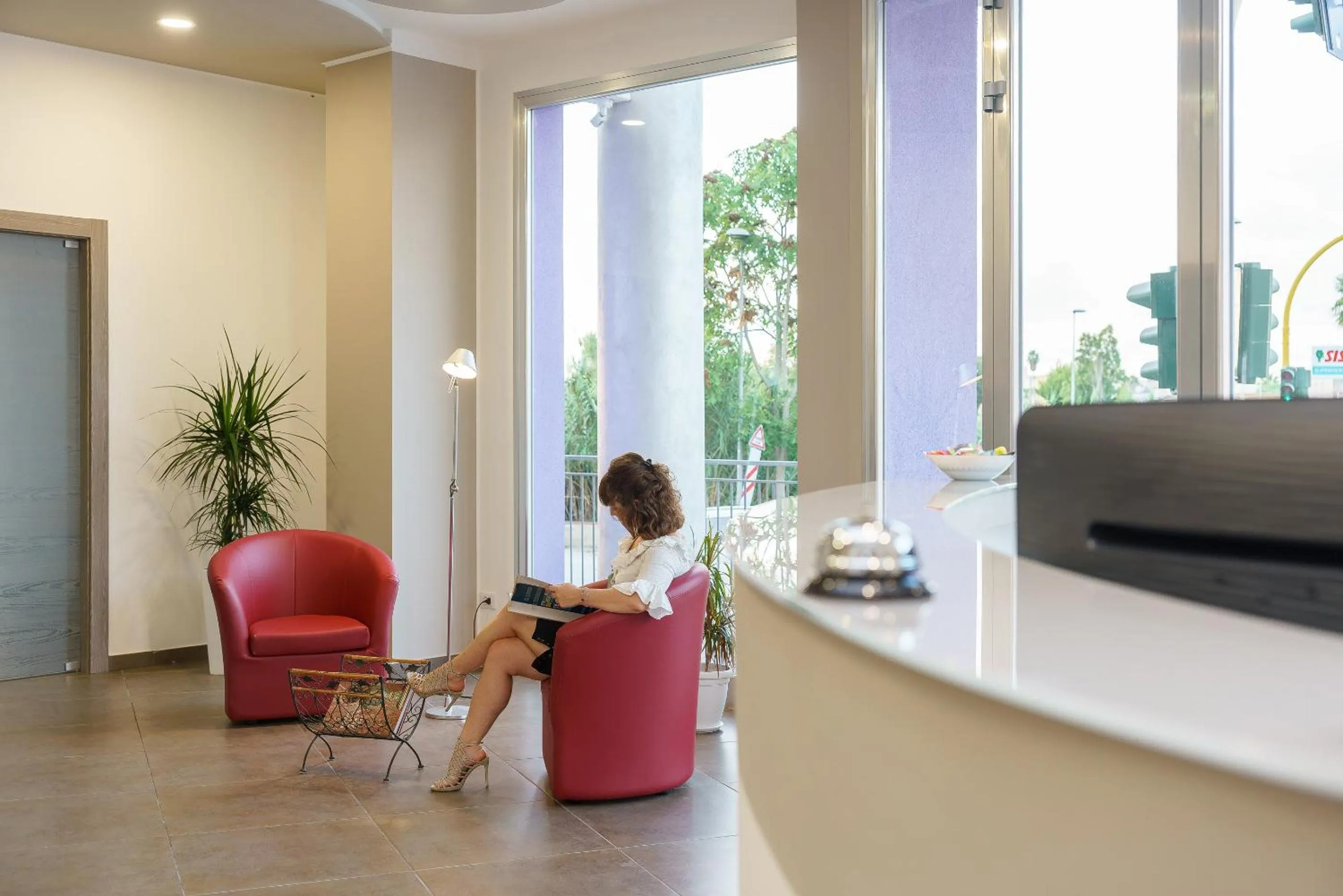 Lobby or reception in Travini Hotel Residence