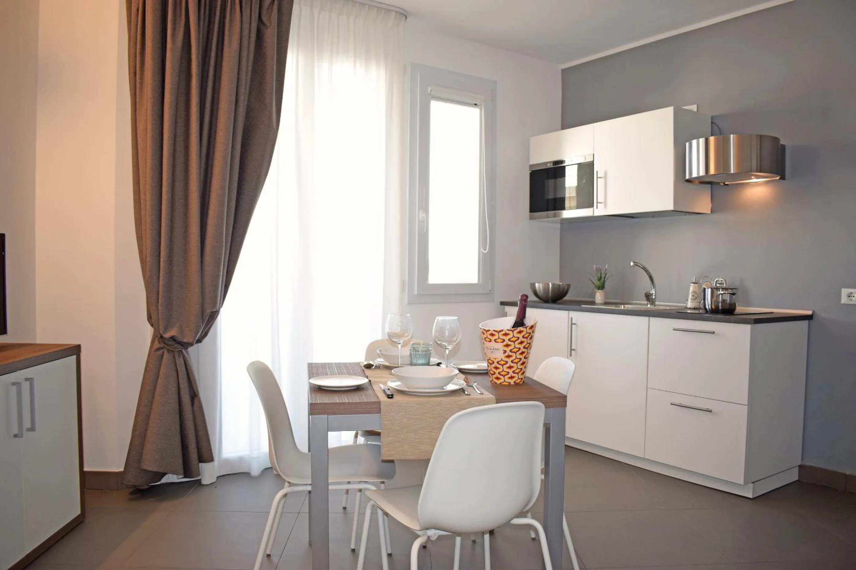 Kitchen or kitchenette in Travini Hotel Residence