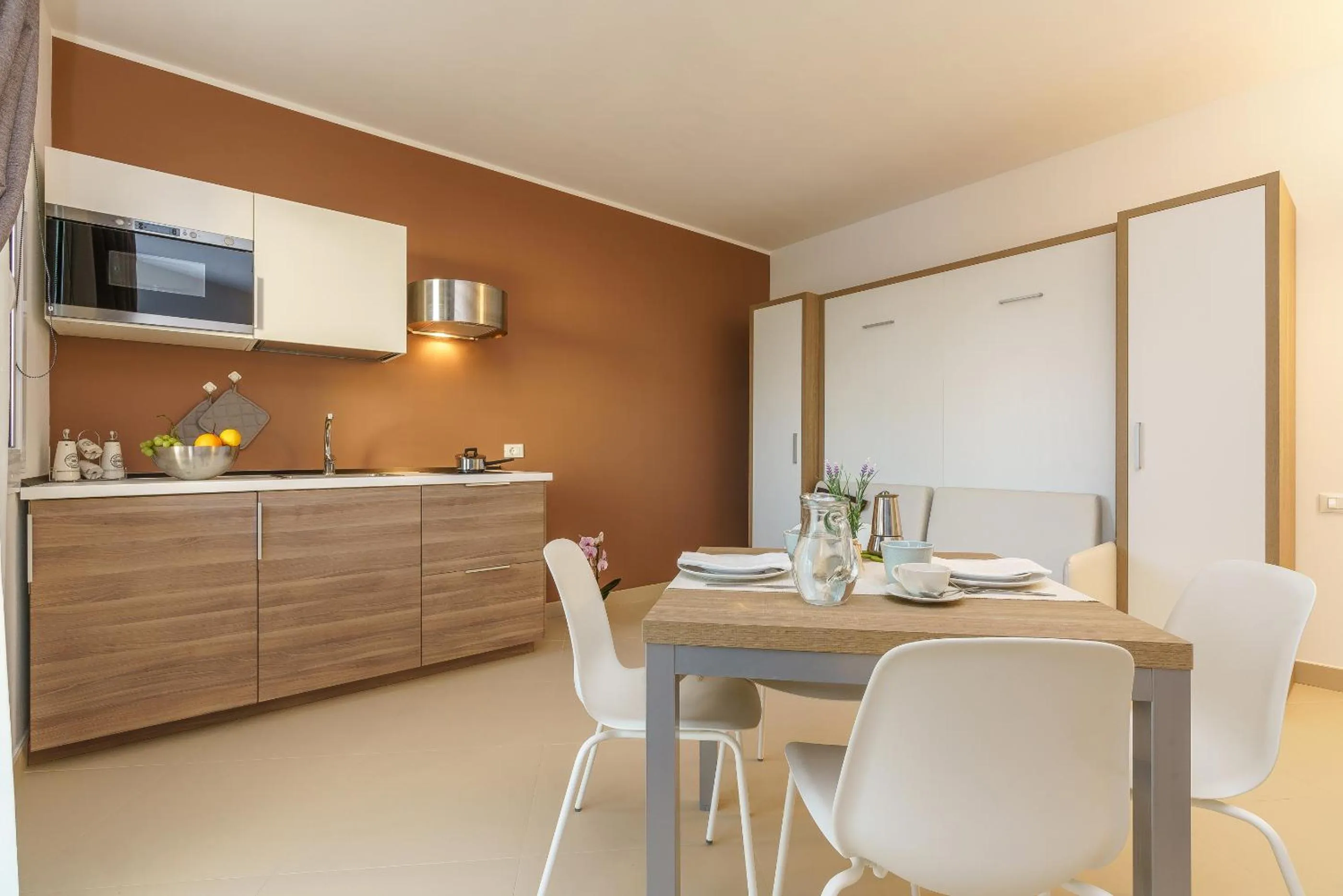 Kitchen or kitchenette in Travini Hotel Residence
