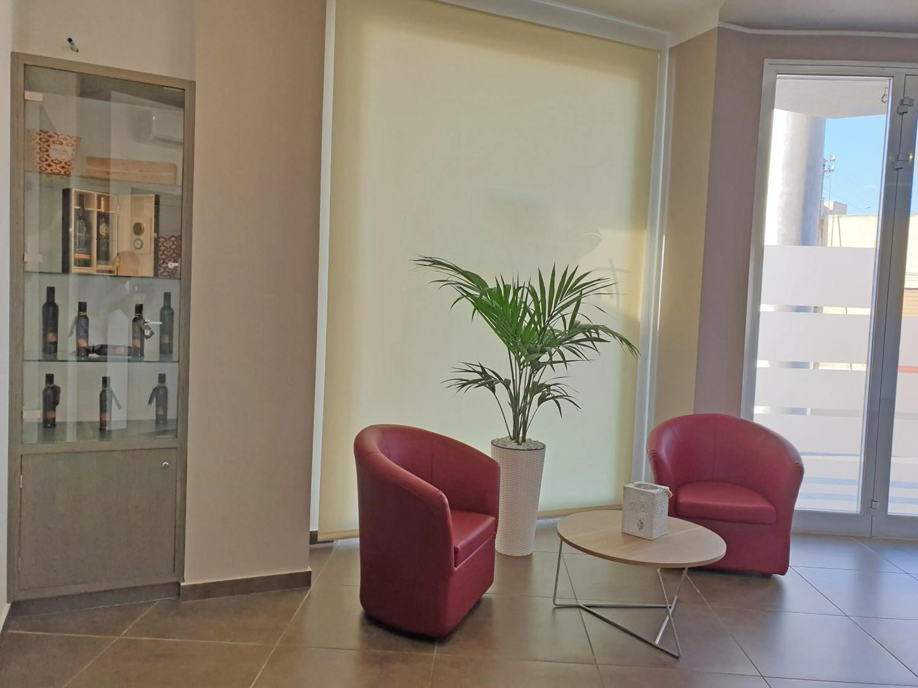 Lobby or reception in Travini Hotel Residence