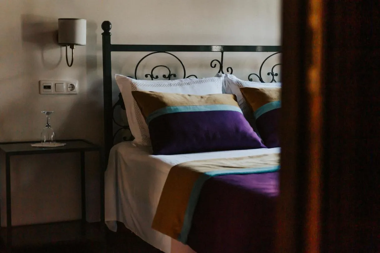 Bed in Misgibi Hotel