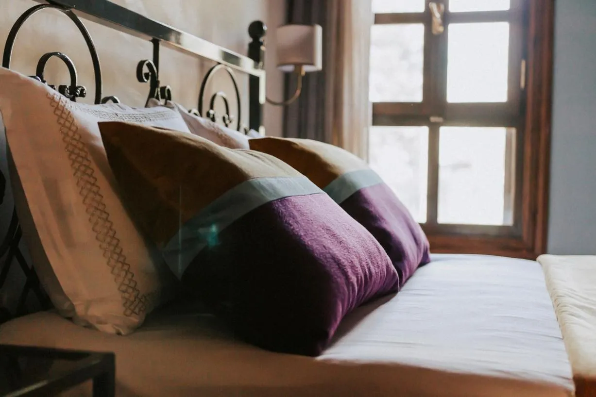 Bed in Misgibi Hotel