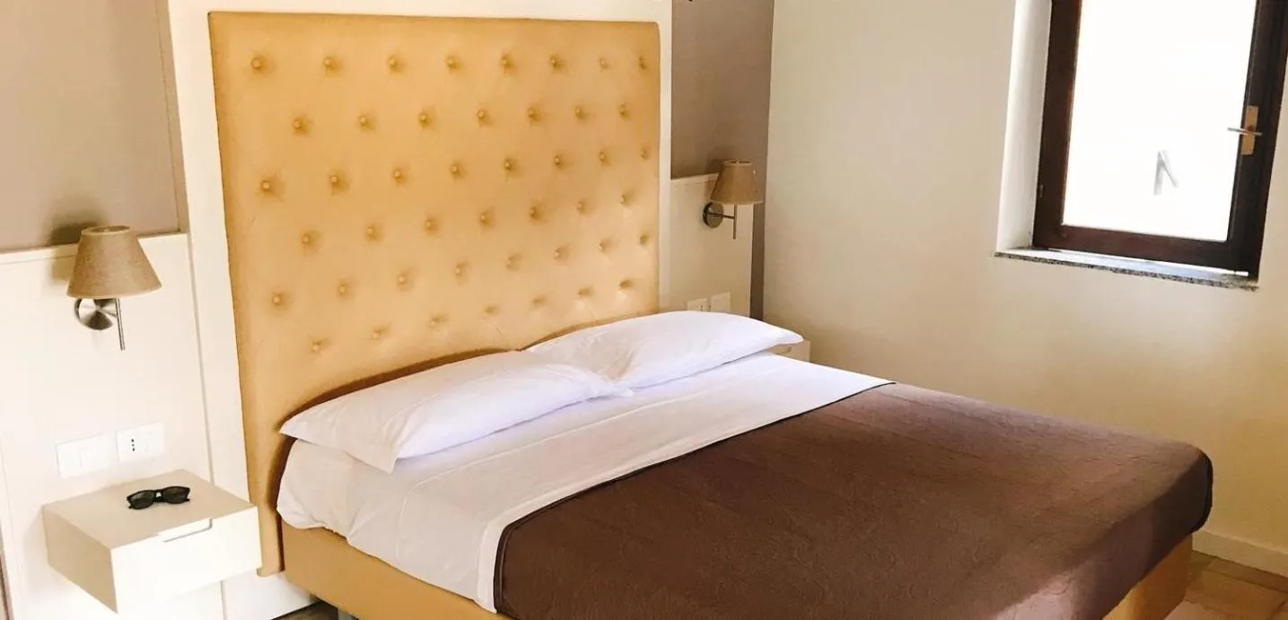 Bed in Hotel Marina del Capo