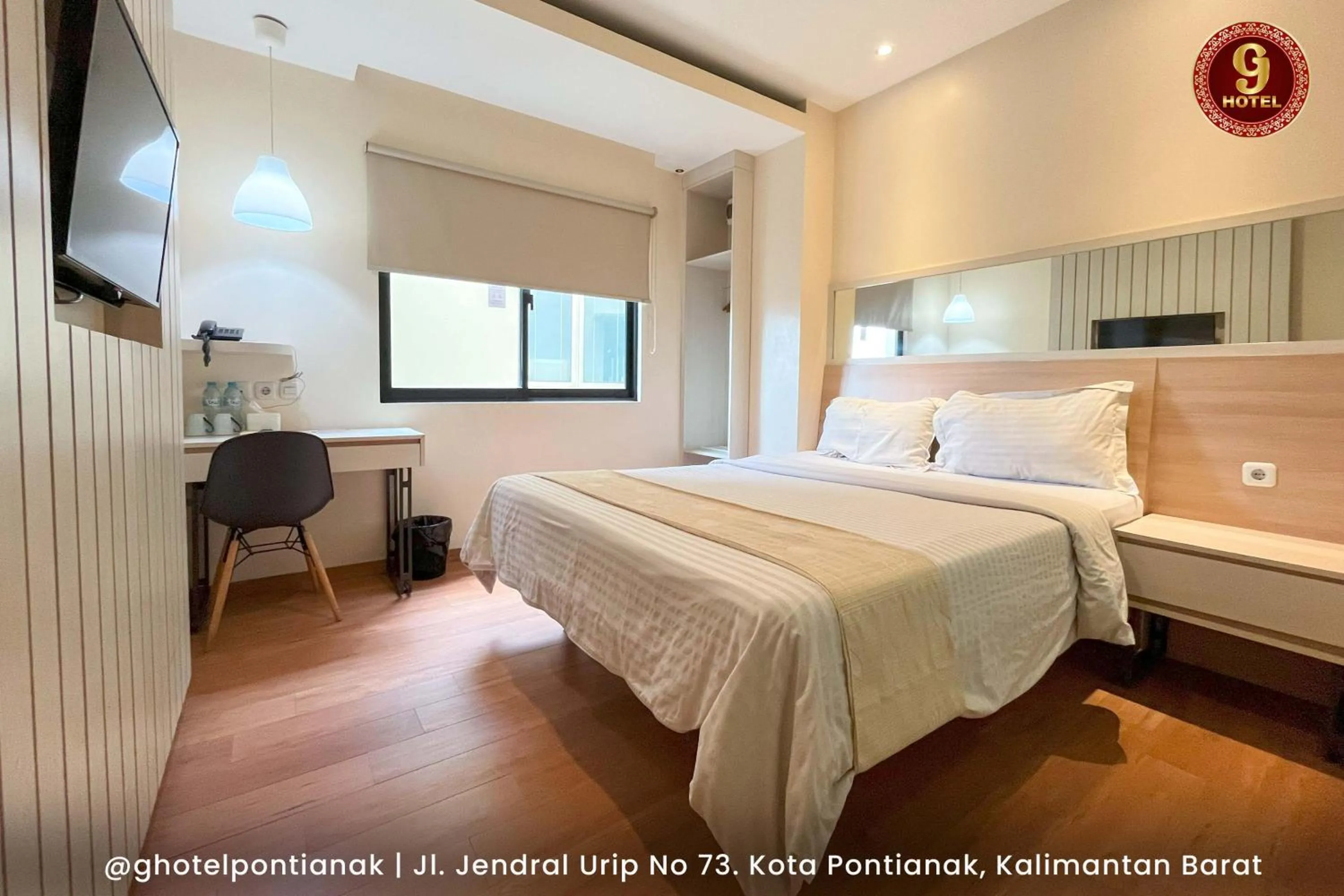 Bed in G-Hotel Pontianak