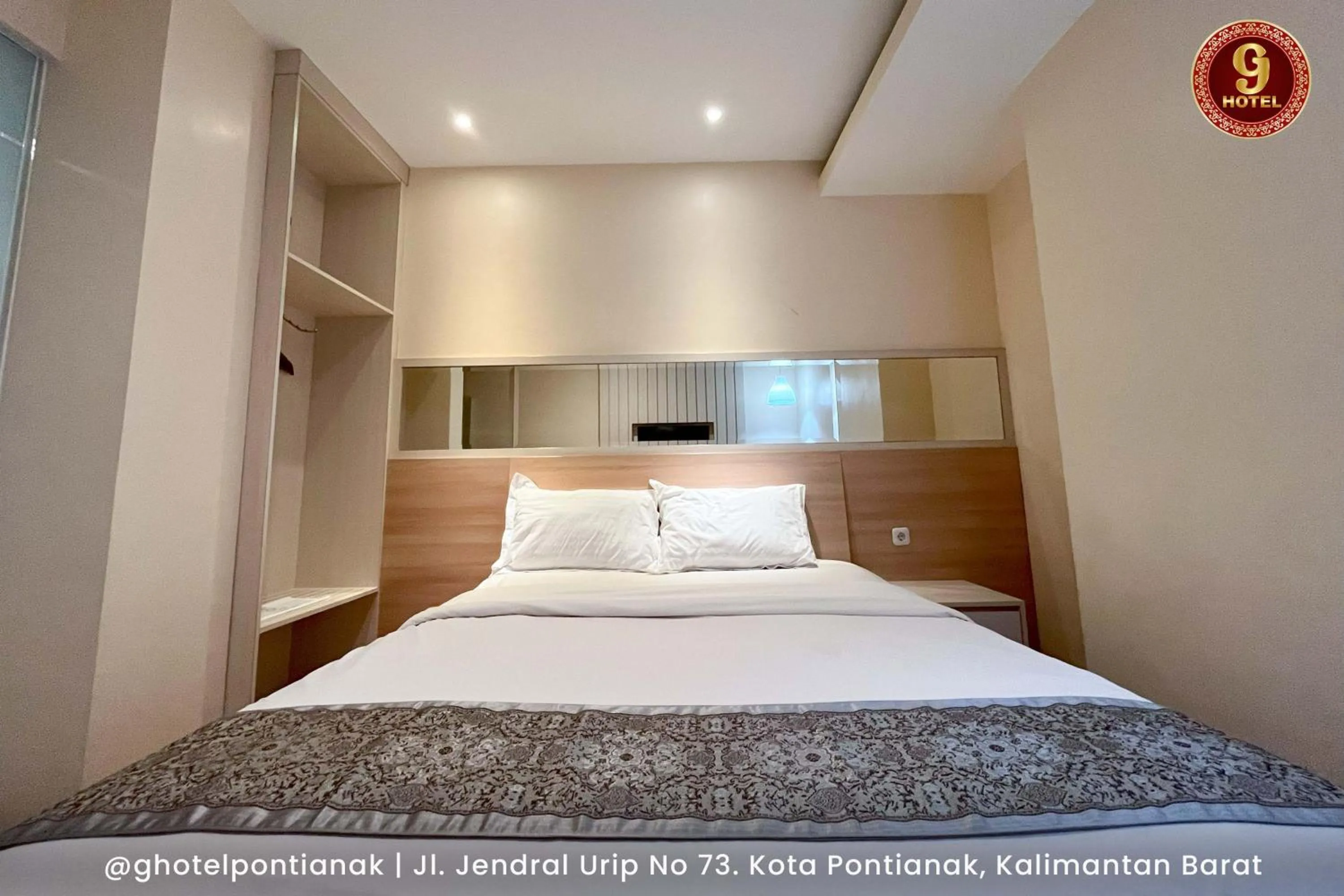 Bed in G-Hotel Pontianak