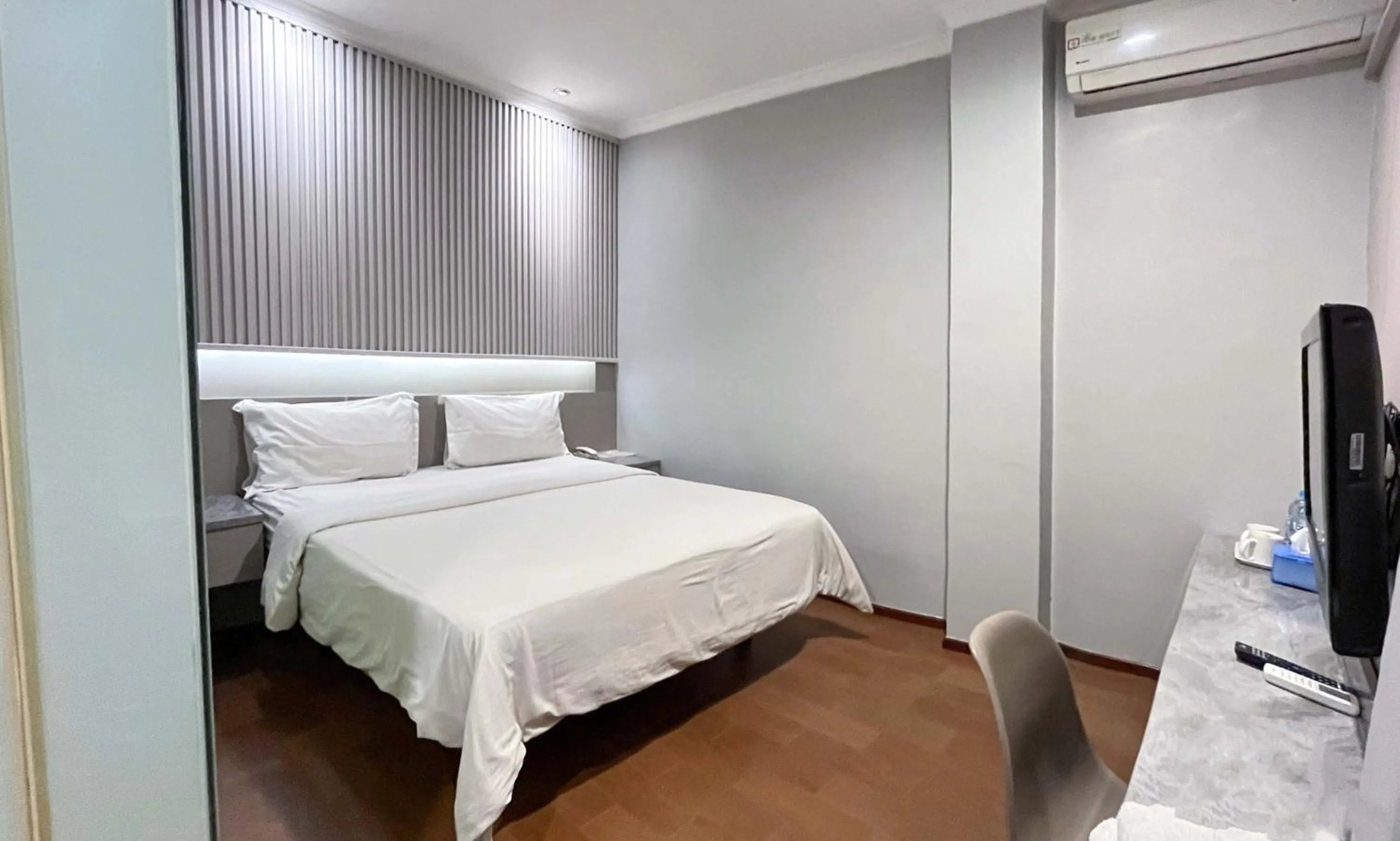 Bed in G-Hotel Pontianak