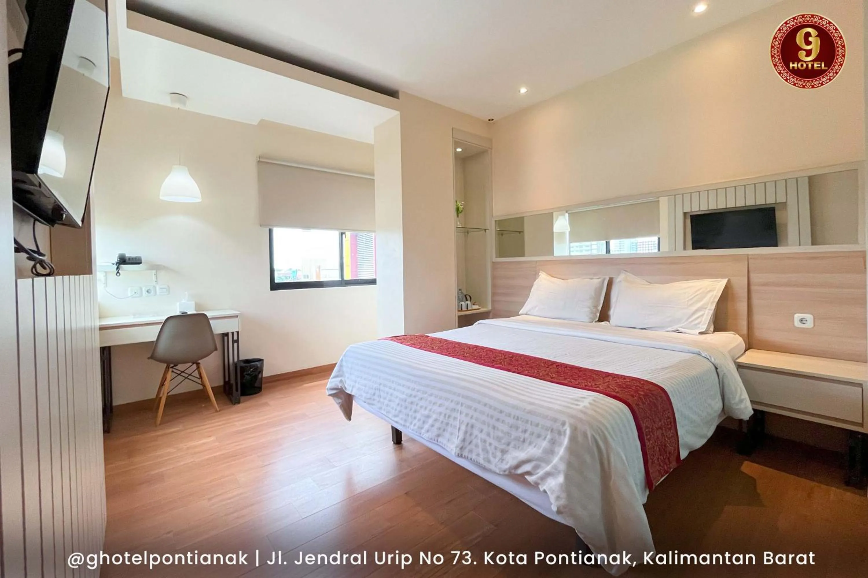 Bed in G-Hotel Pontianak