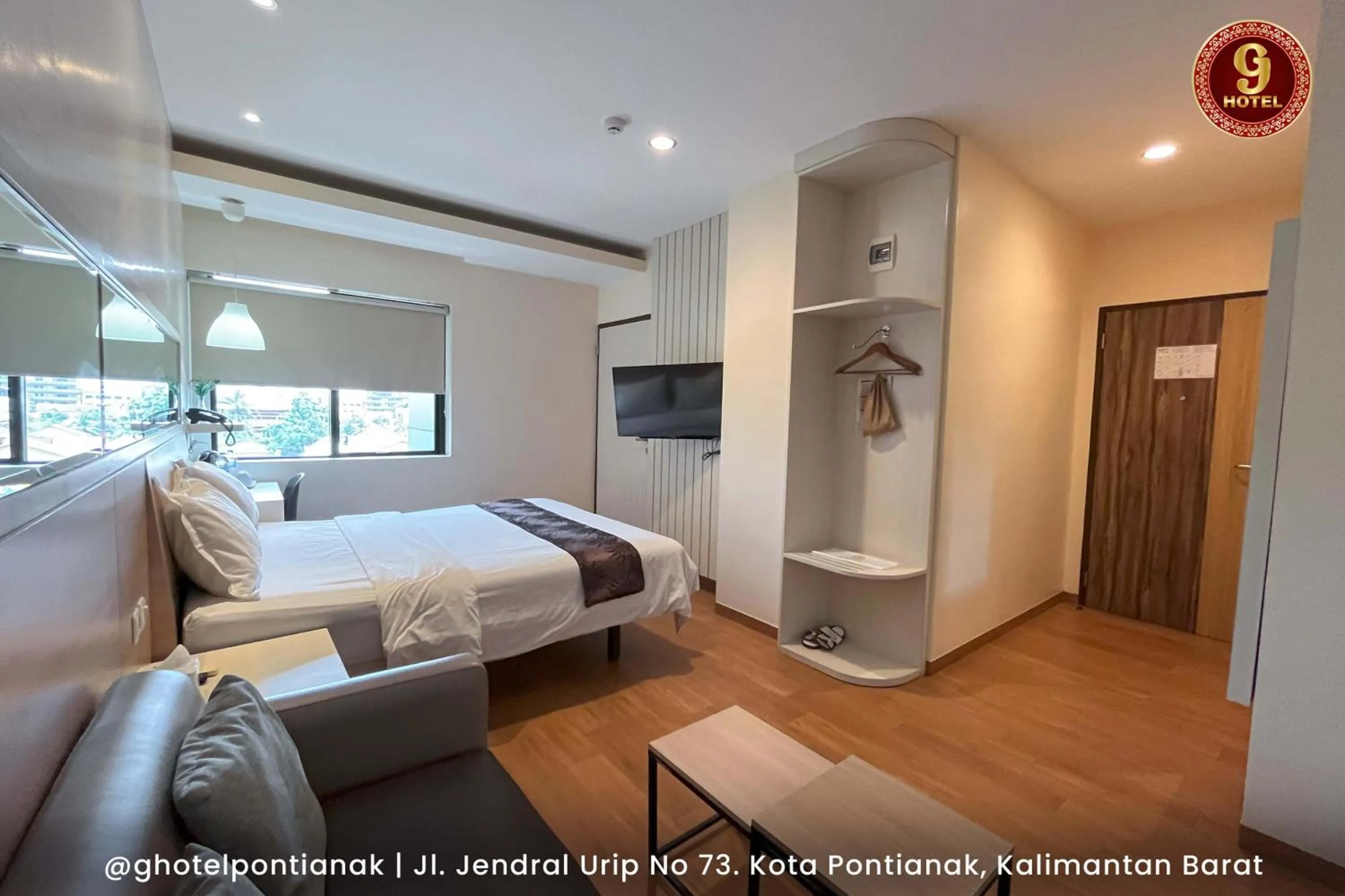 Bed in G-Hotel Pontianak