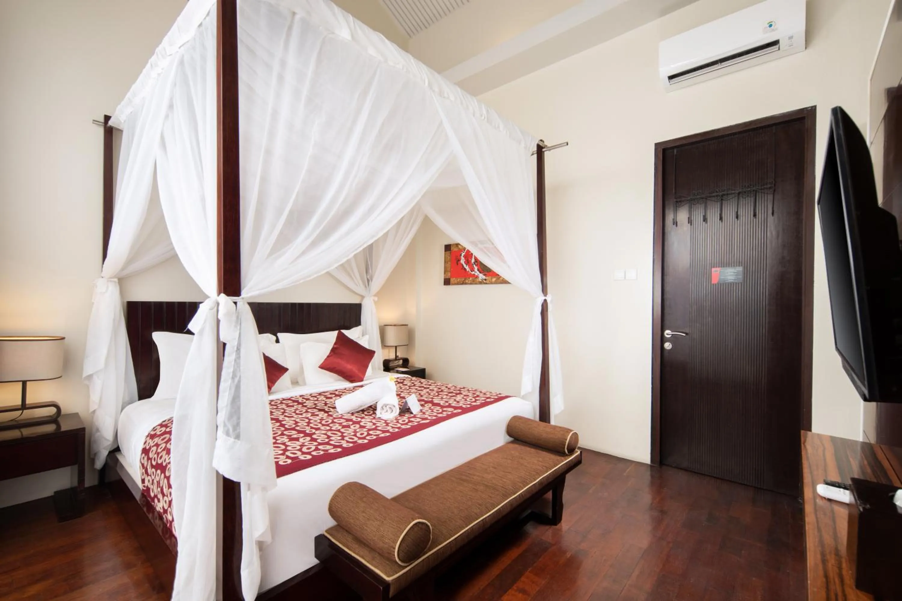 Bed in 18 Suite Villa Loft at Kuta