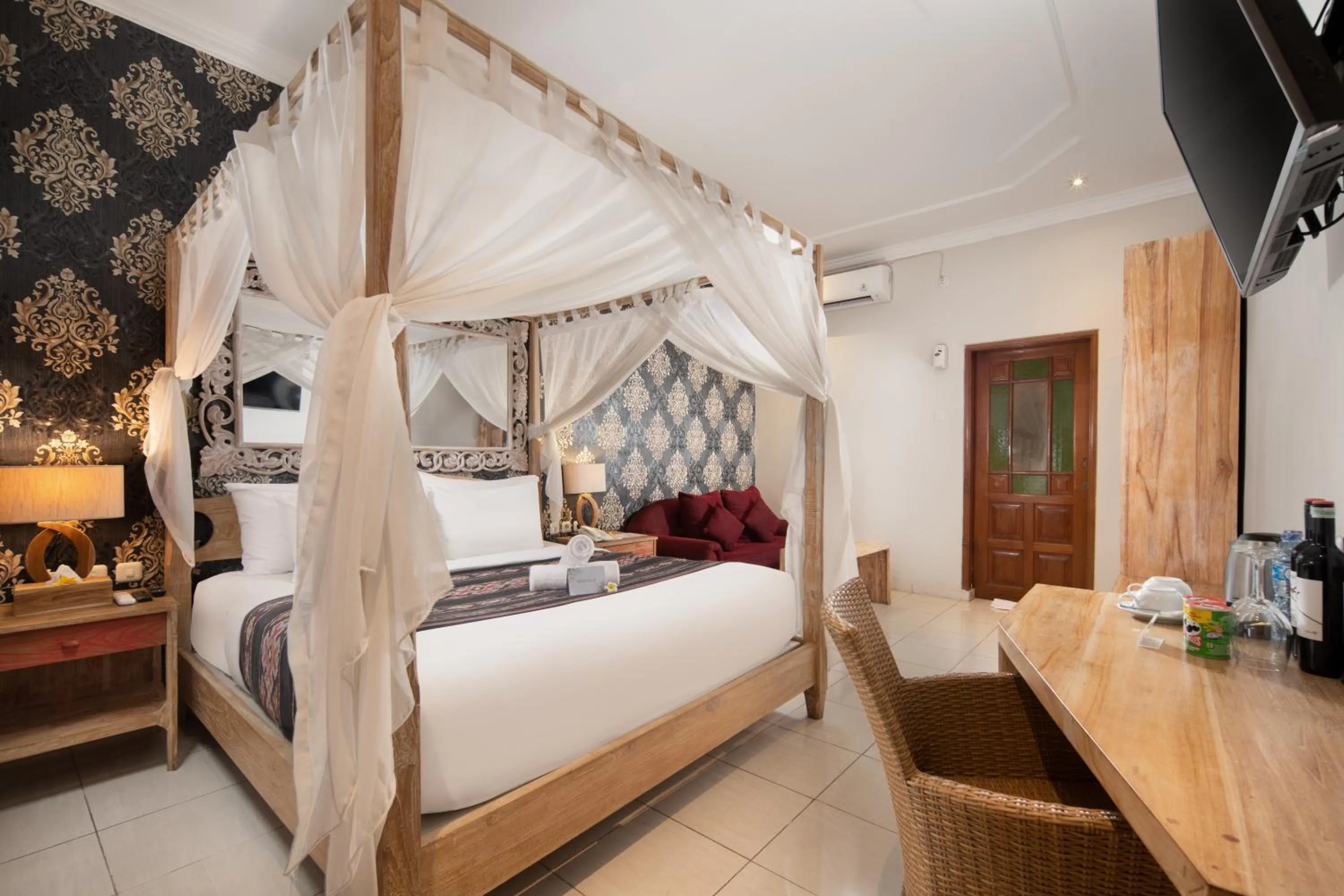 Bed in 18 Suite Villa Loft at Kuta