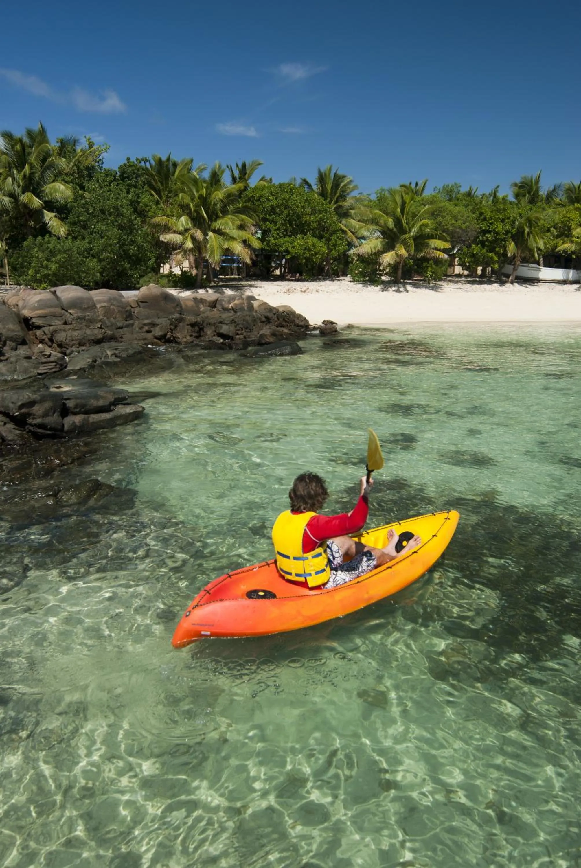Canoeing in Barefoot Manta Island Resort