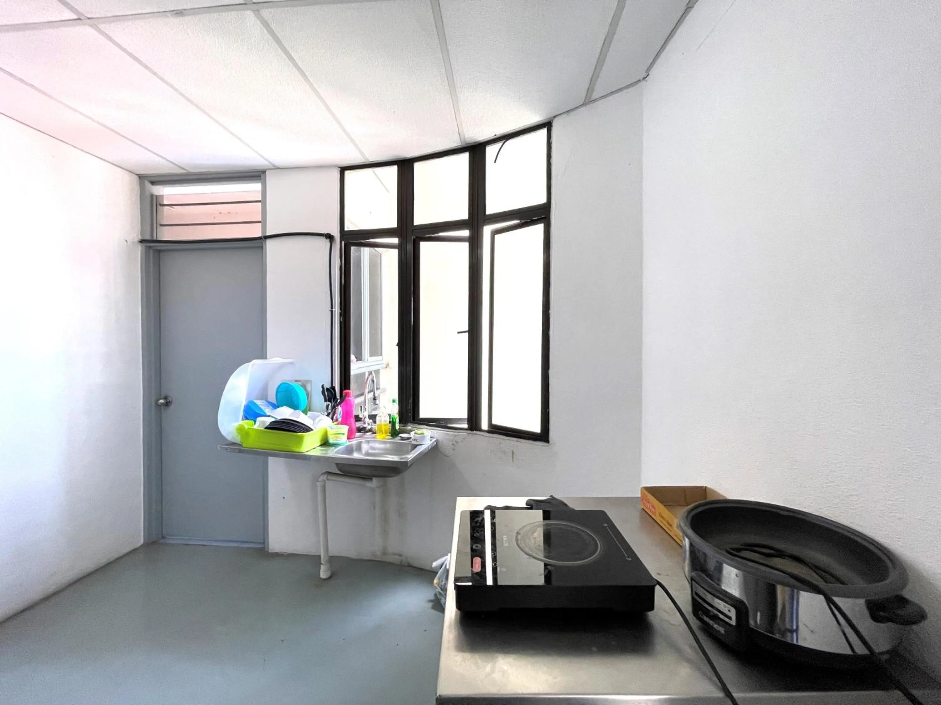 Kitchen or kitchenette in Hotel O Wg Guest House