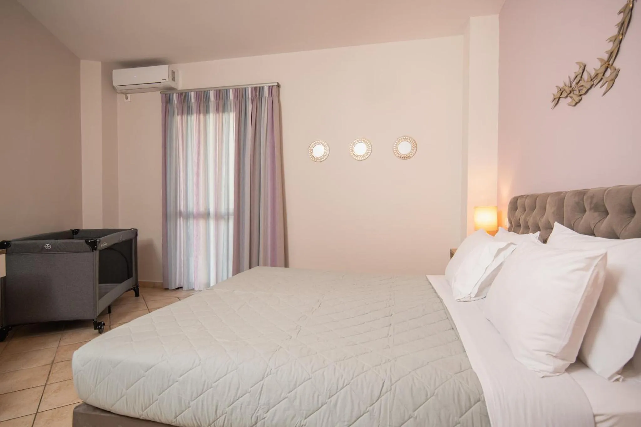 Bed in Koukos Loft Apartments