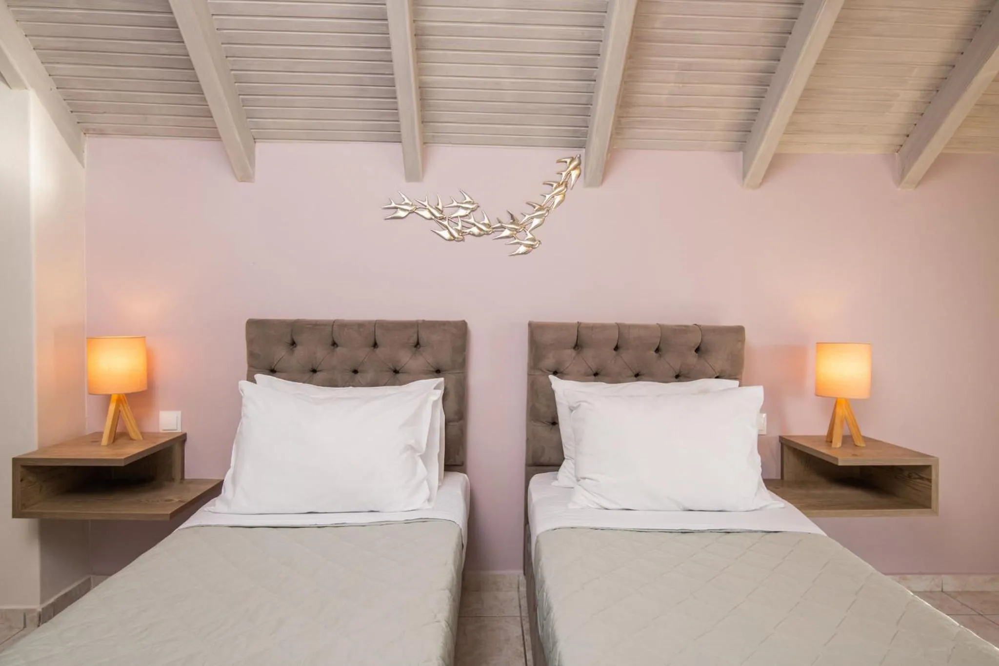 Bed in Koukos Loft Apartments