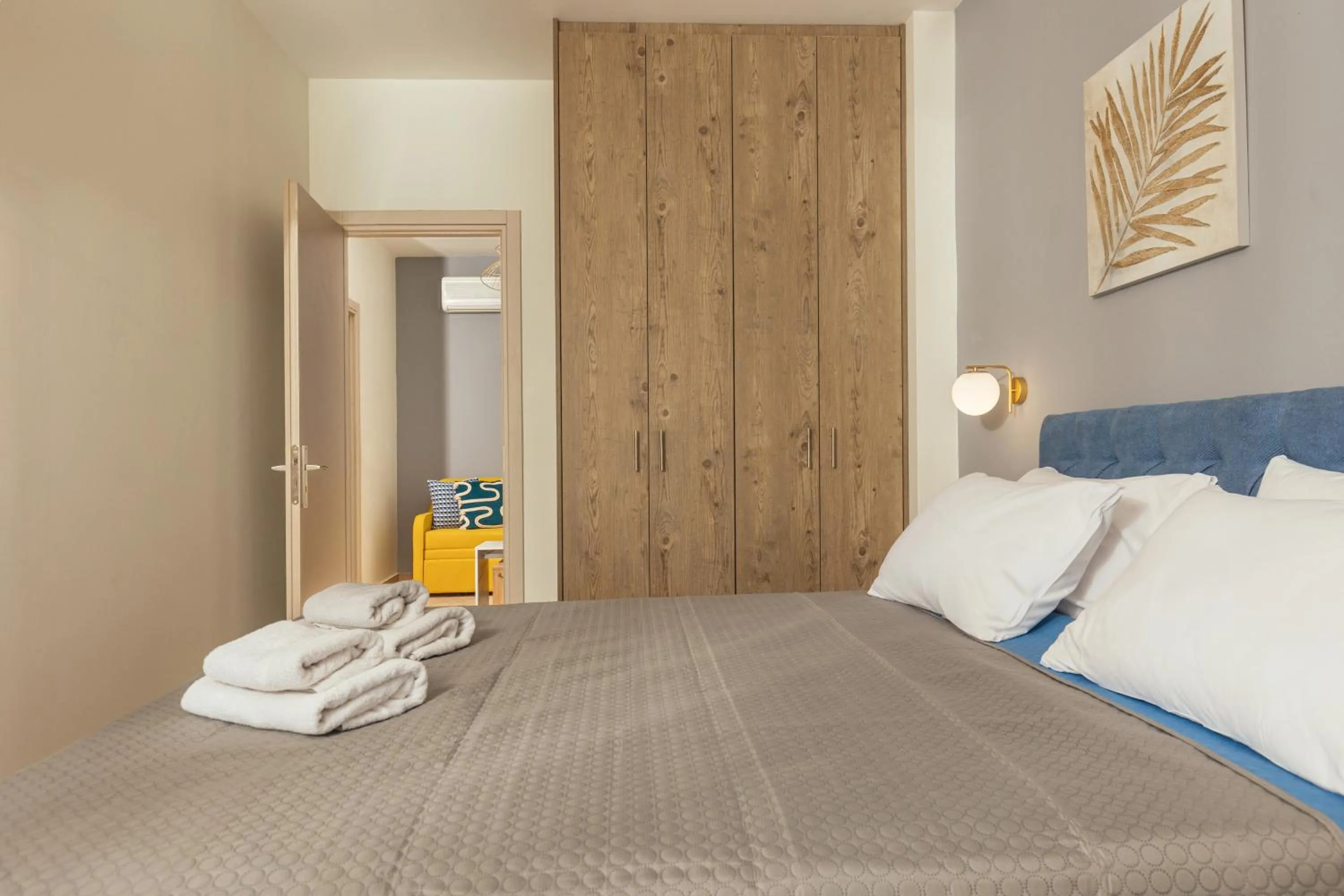 Bed in Koukos Loft Apartments