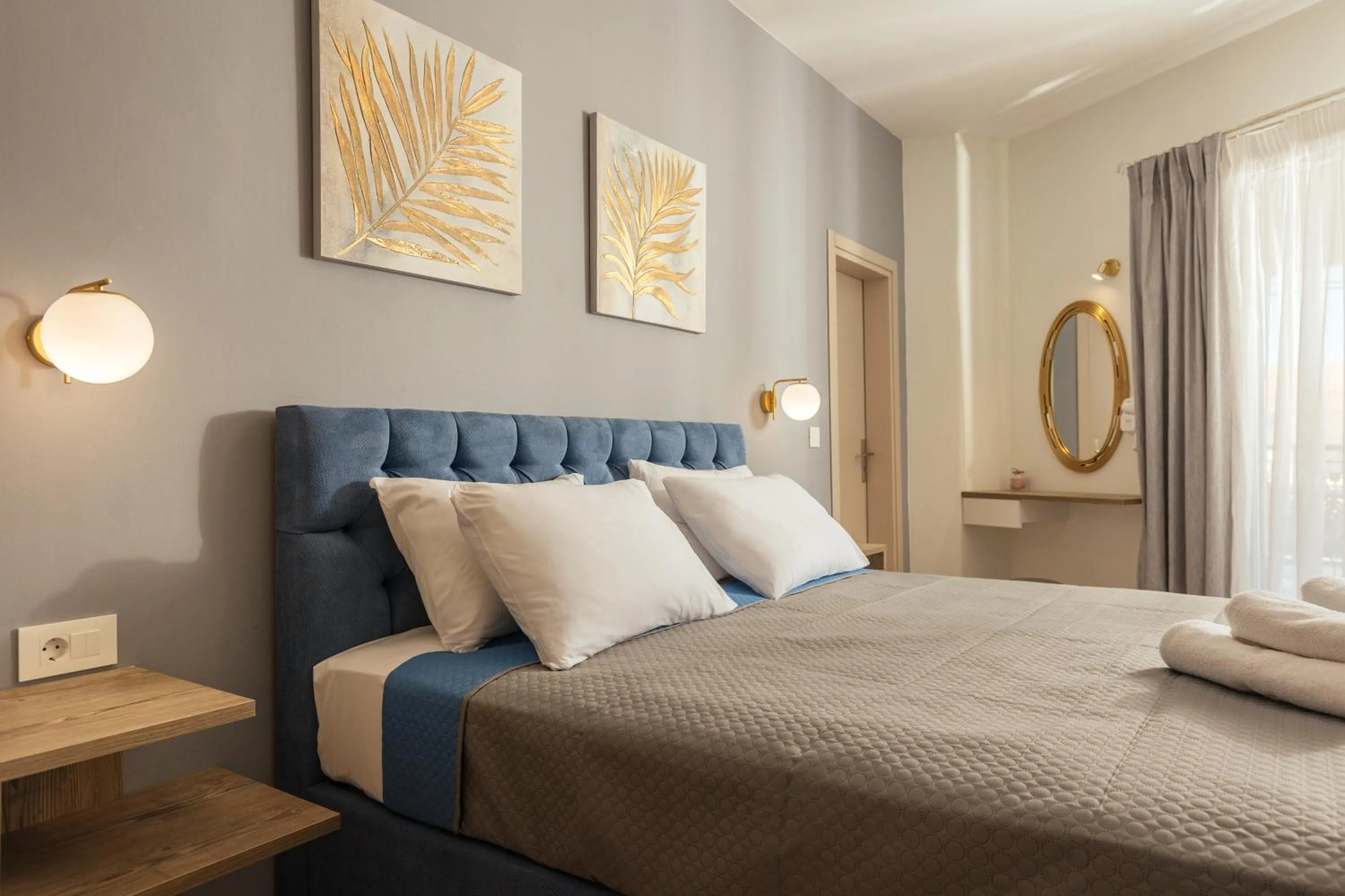 Bed in Koukos Loft Apartments