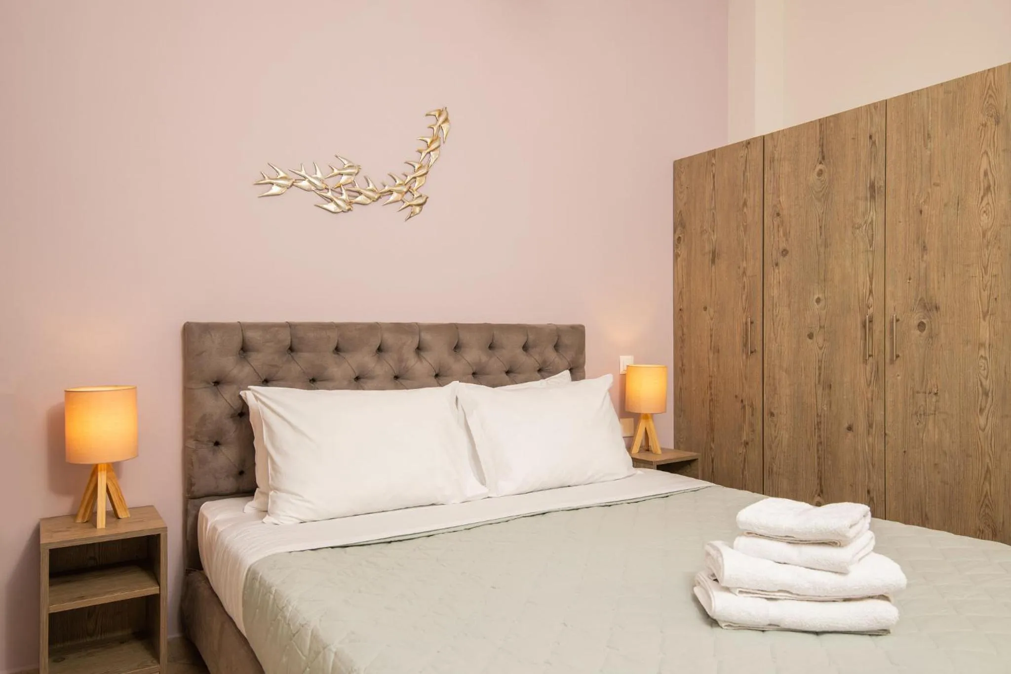 Bed in Koukos Loft Apartments