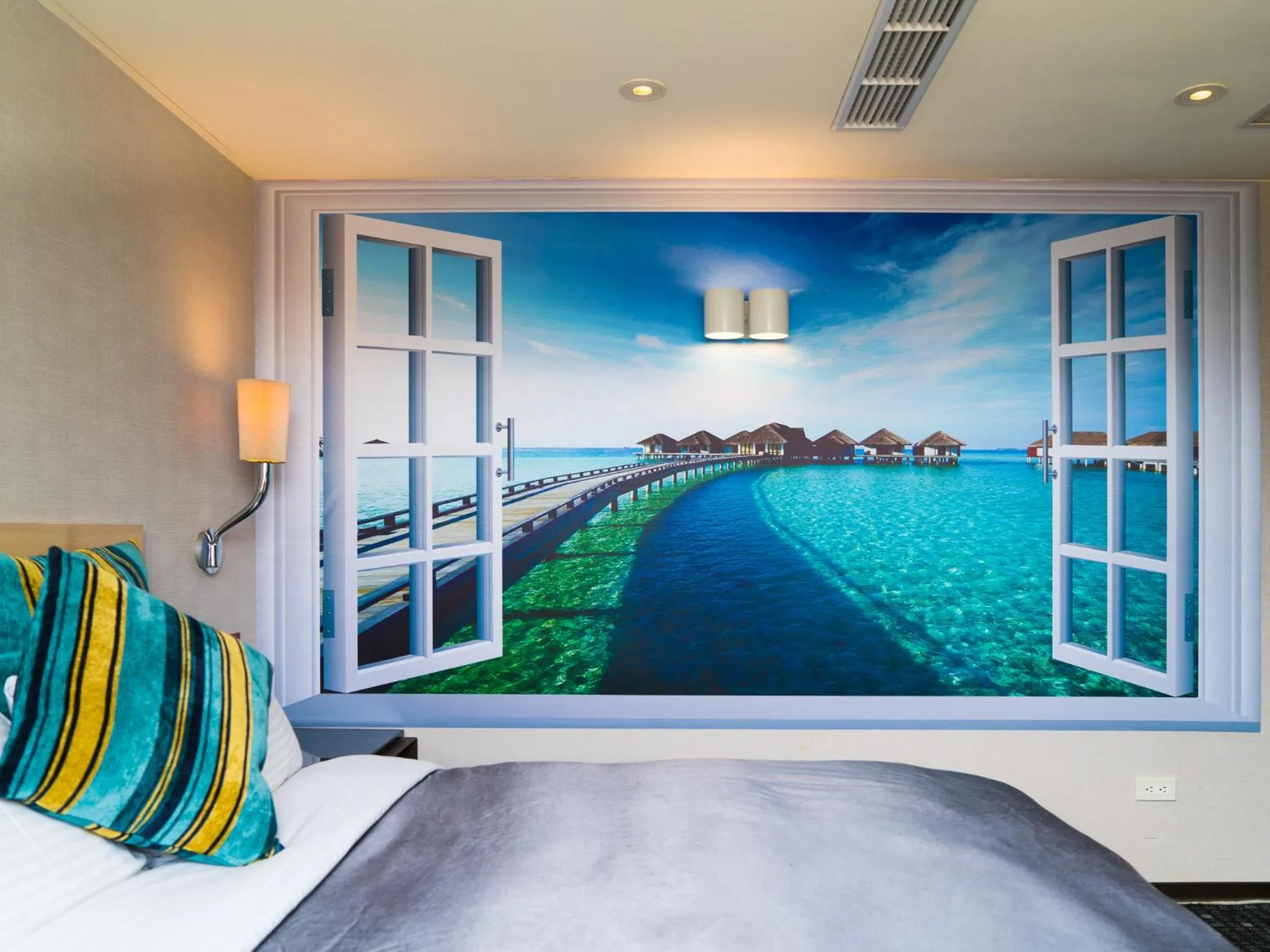 Bed in E-House Hotel