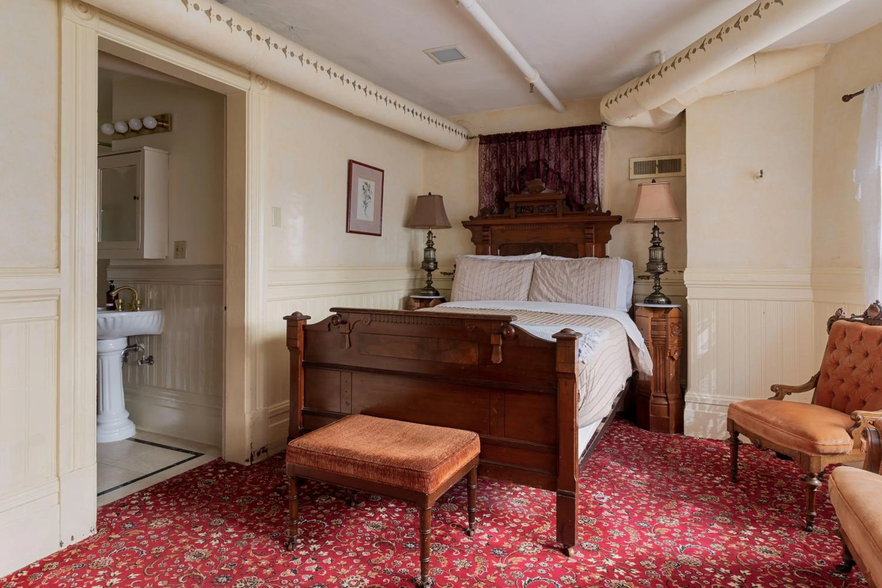 Bedroom in Chateau Tivoli Bed and Breakfast