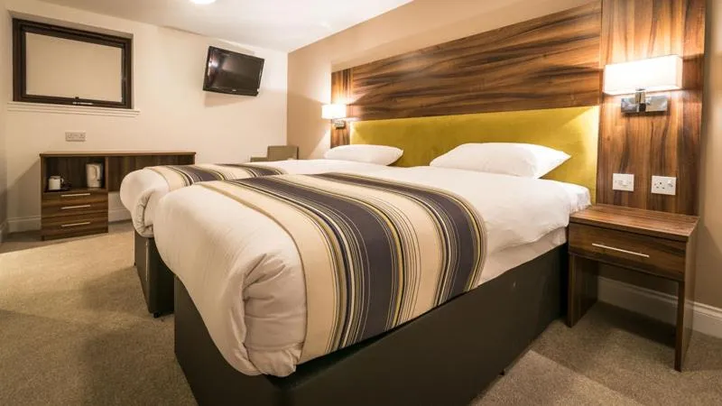 Bed in Livingston Lodge Hotel